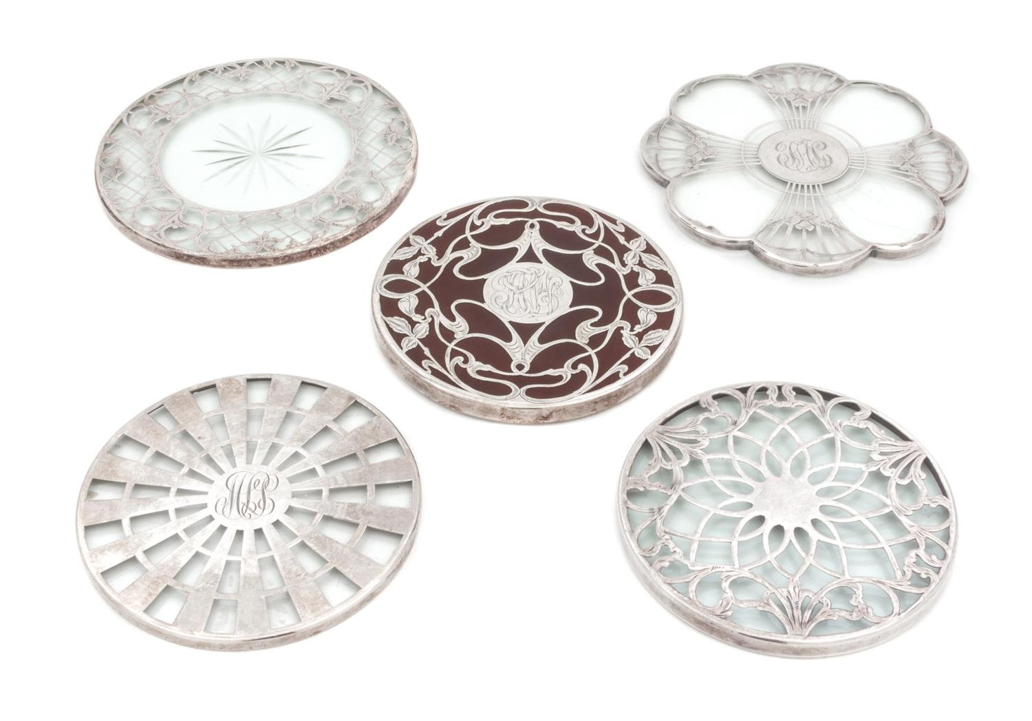 Five Silver Overlay Trivets Diameter of largest 5 7/8 inches.