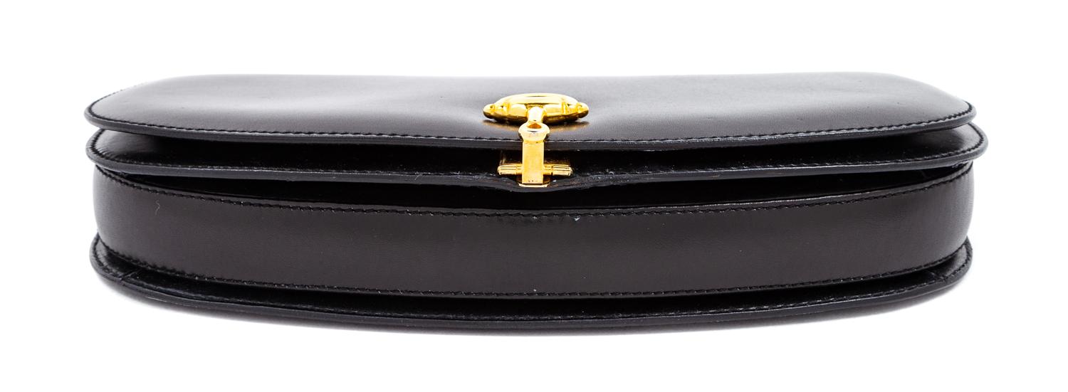 A Gucci Black Leather Vintage Clutch, 5" H x 9.5" W x 1.5" D.