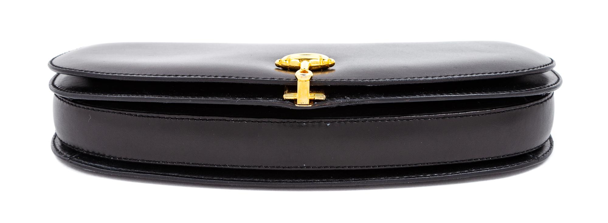 A Gucci Black Leather Vintage Clutch, 5" H x 9.5" W x 1.5" D.