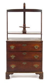 A George II Oak Linen Press on Chest, Height 62 1/2 x width 34 x depth 18 1/2 inches.