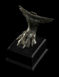 A Greco-Roman Bronze Winged Cista Foot