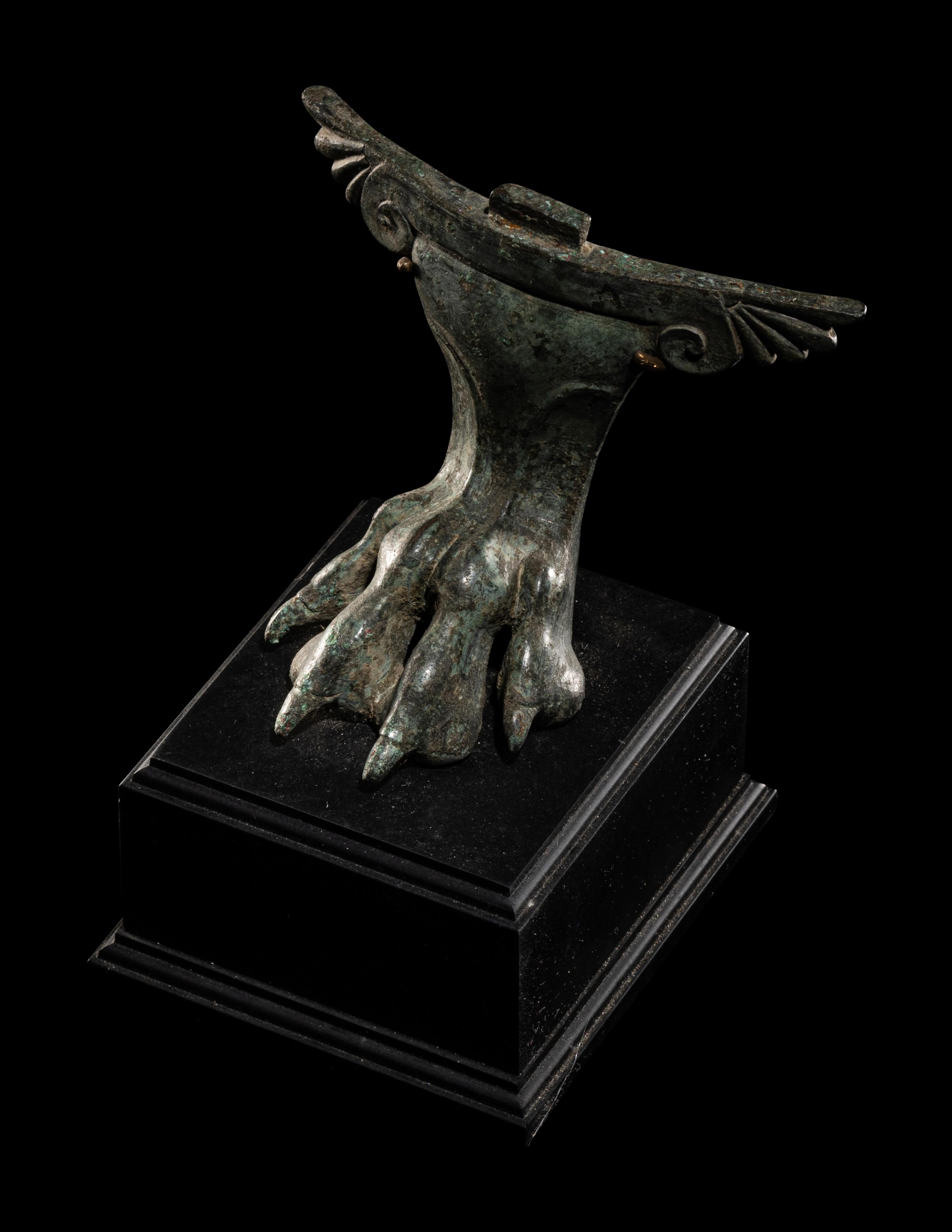 A Greco-Roman Bronze Winged Cista Foot