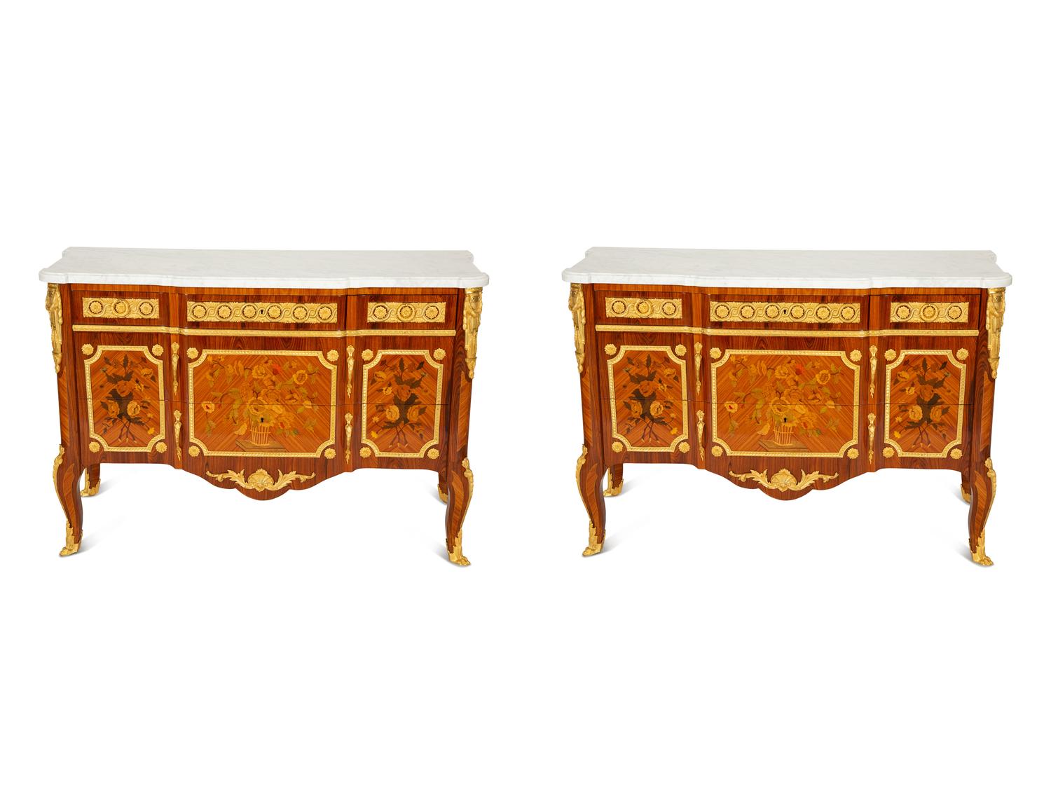 A Pair of Louis XV/XVI Transitional Style Gilt Bronze Mounted Marquetry Marble-Top Commodes