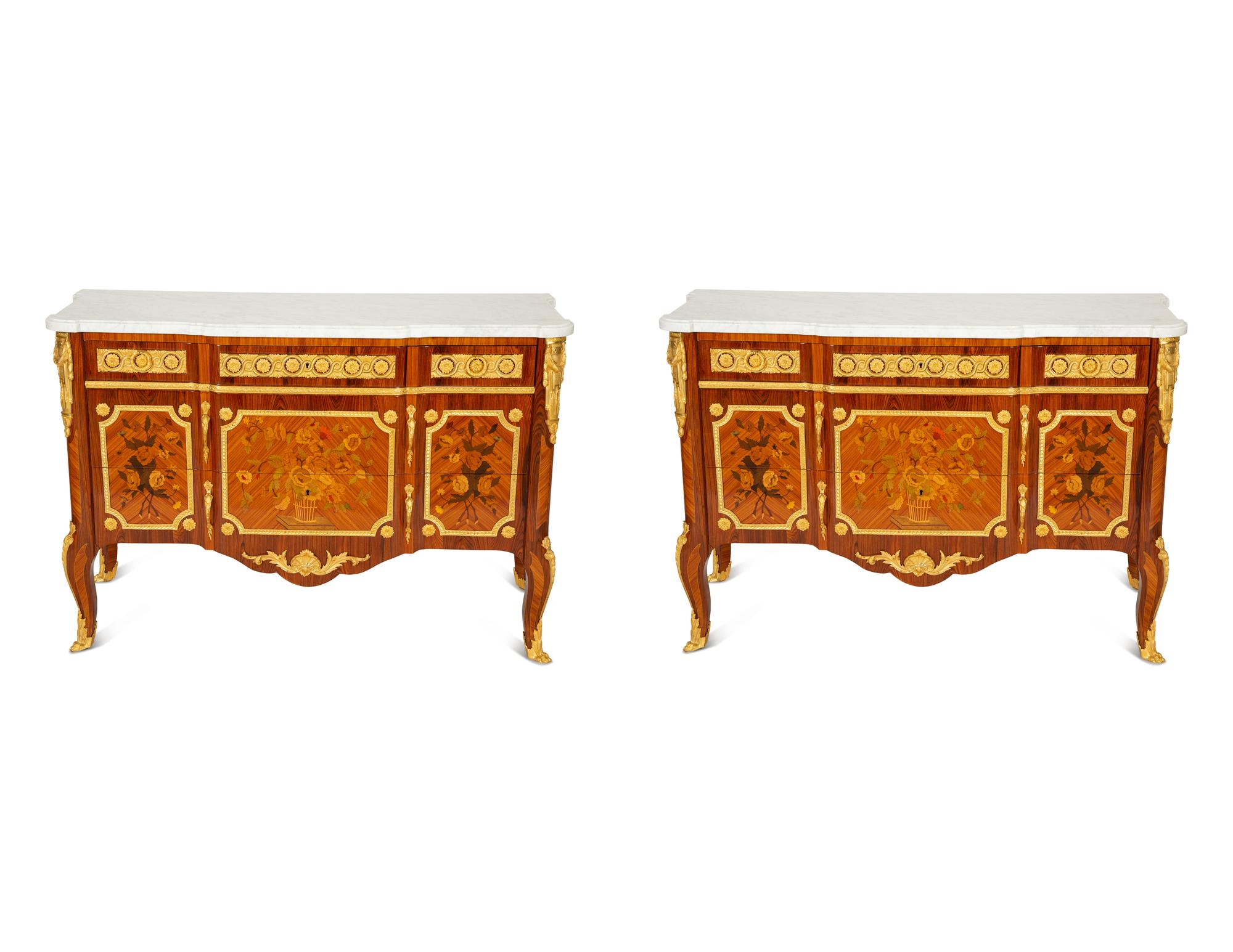 A Pair of Louis XV/XVI Transitional Style Gilt Bronze Mounted Marquetry Marble-Top Commodes