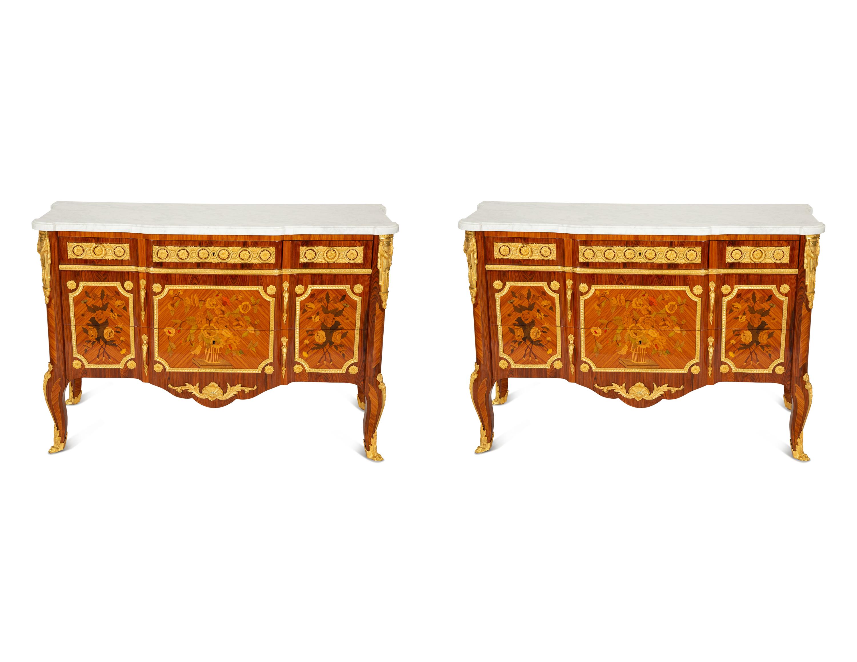 A Pair of Louis XV/XVI Transitional Style Gilt Bronze Mounted Marquetry Marble-Top Commodes