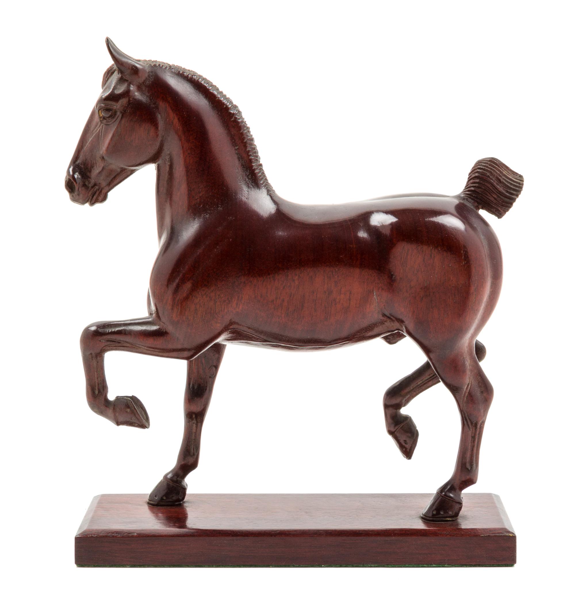 A Carved Wood Figure of a Horse Height 10 1/2 inches. — ATTRIBUTED TO PETER GIBA, 20TH CENTURY