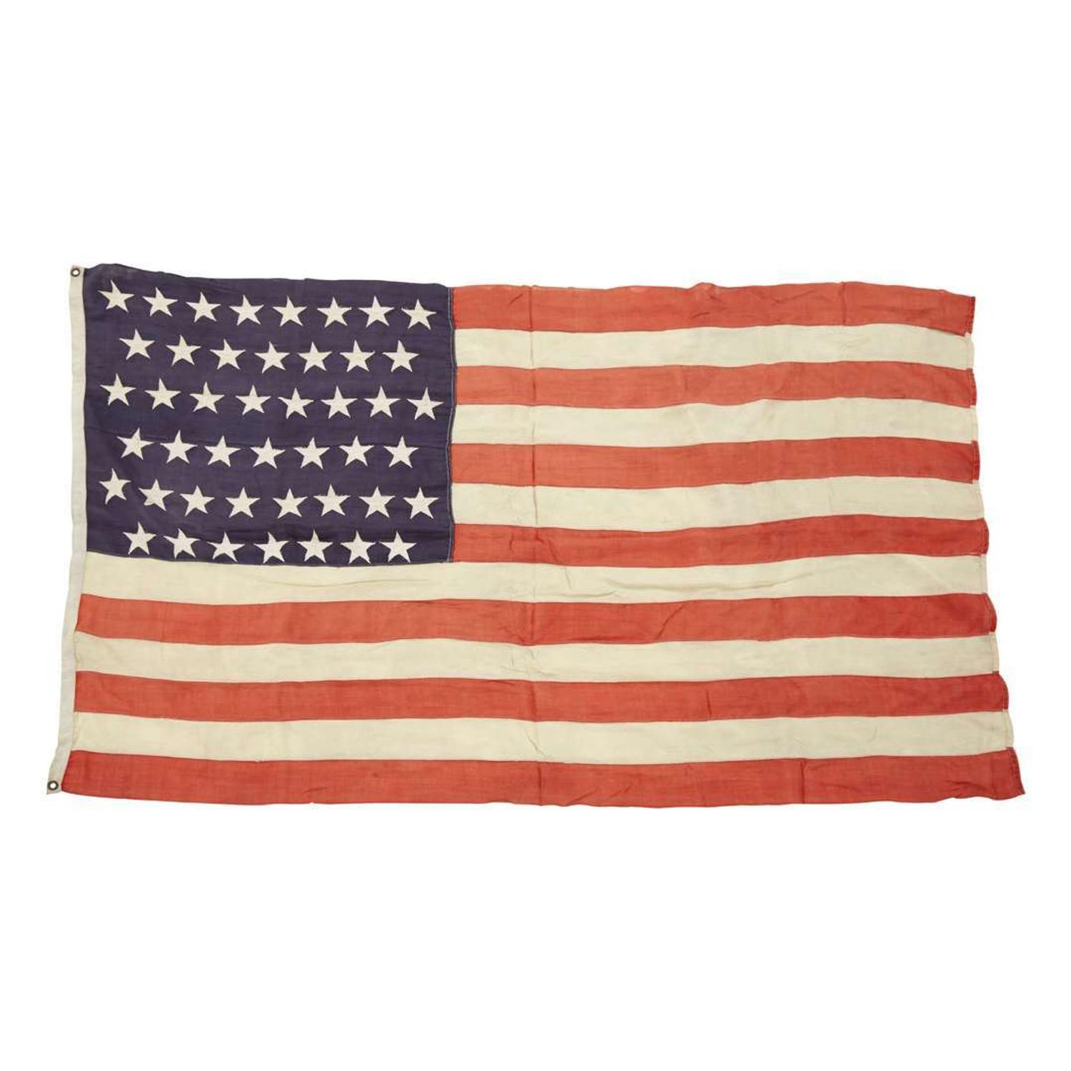 Four 45-Star American Flags and a French Tri-Color Flag O. H. Batchelder & Co., W. M. Horstmann, Philadelphia, and C. W. White Decorator, circa 1898-1900