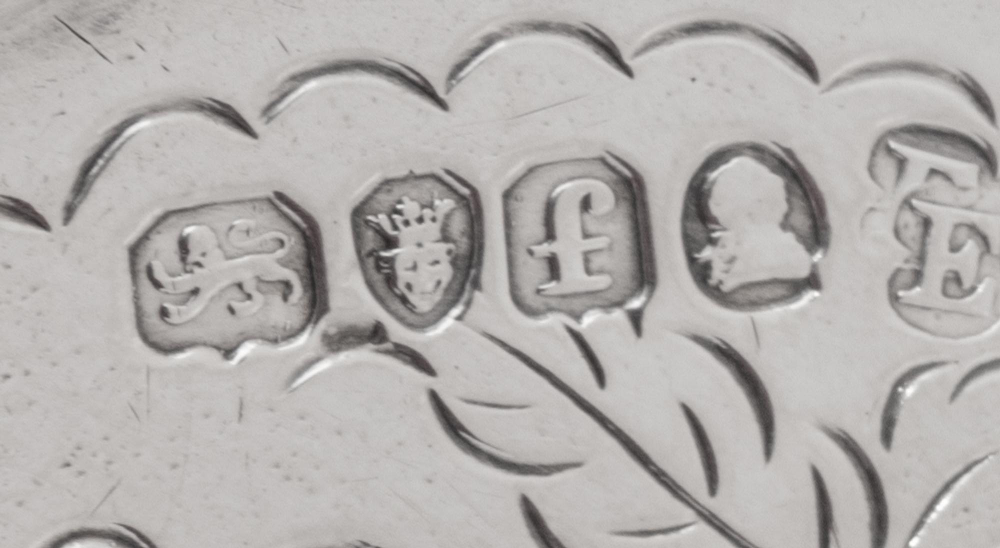 A Pair of George III Silver Salvers