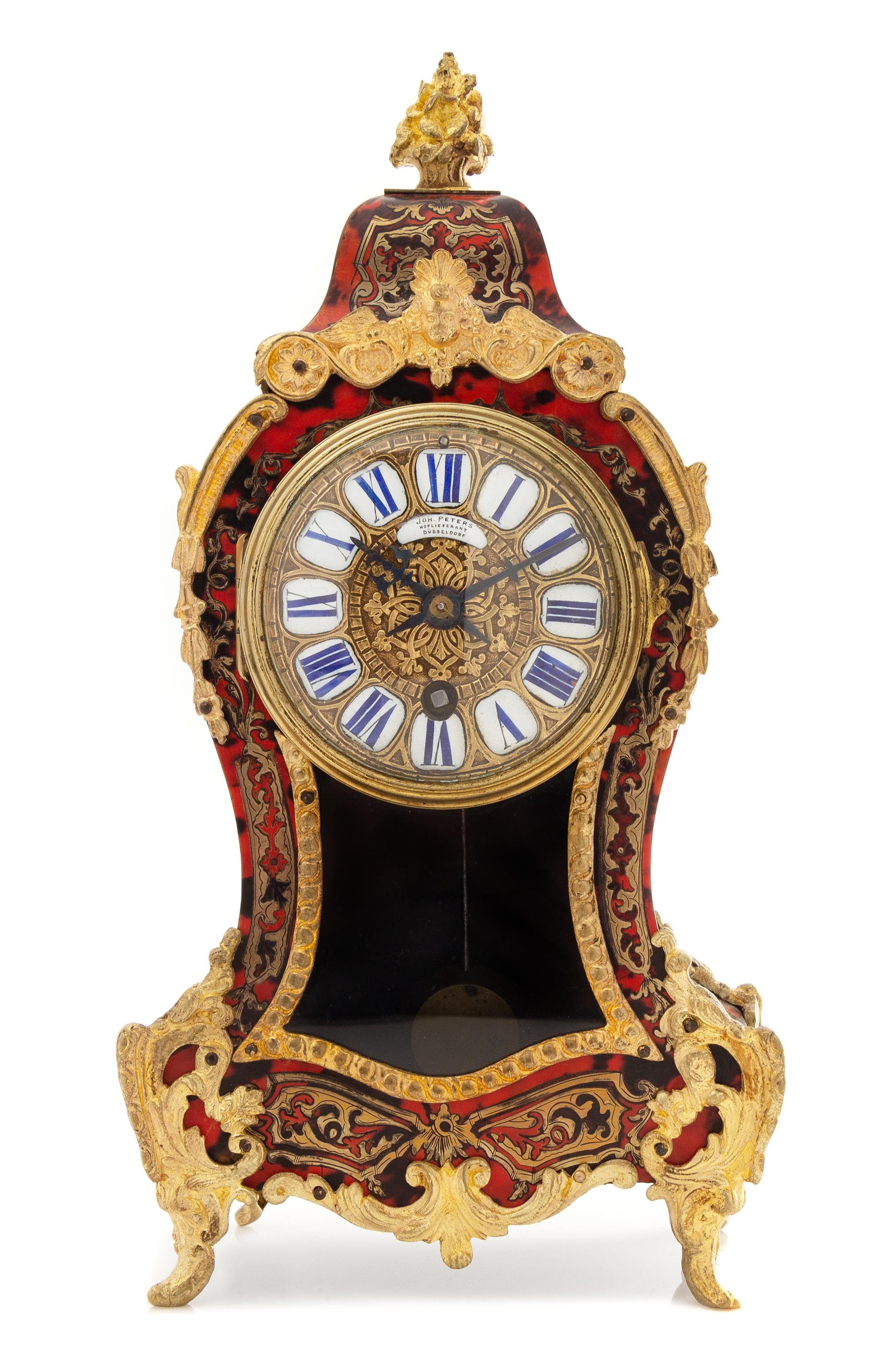 A German Boulle Marquetry Mantel Clock Height 12 1/2 x width 6 1/4 x depth 3 1/2 inches. — LATE 19TH CENTURY/EARLY 20TH CENTURY