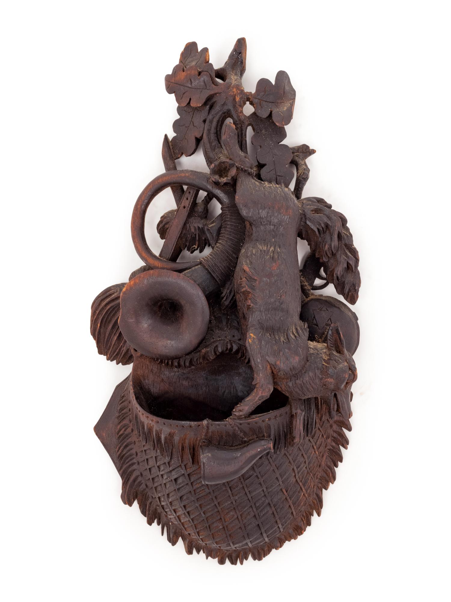 A Black Forest Carved Wall Pocket