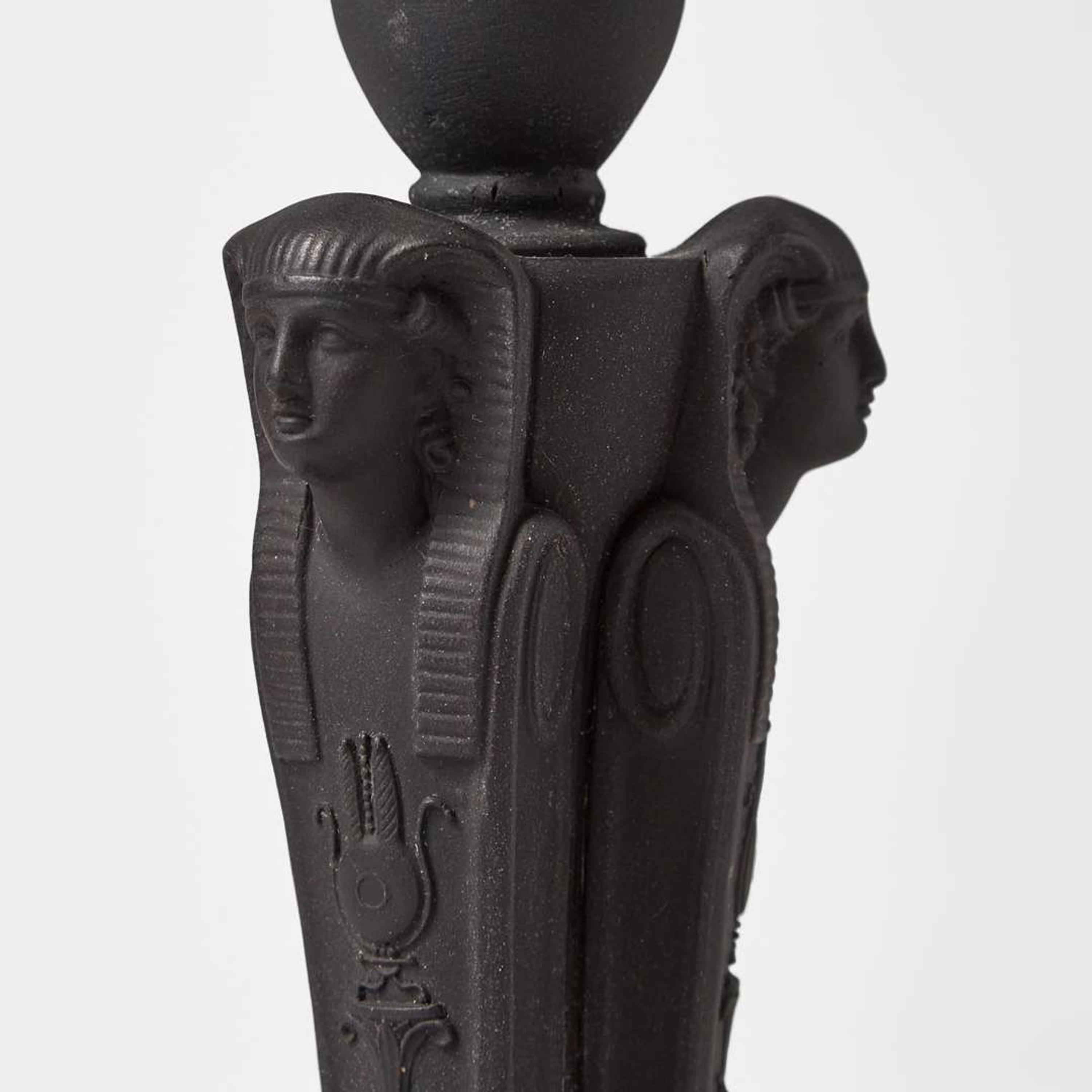 A Wedgwood Black Basalt Egyptian Revival Sphinx Monopodia Candleholder UK, early 19th century