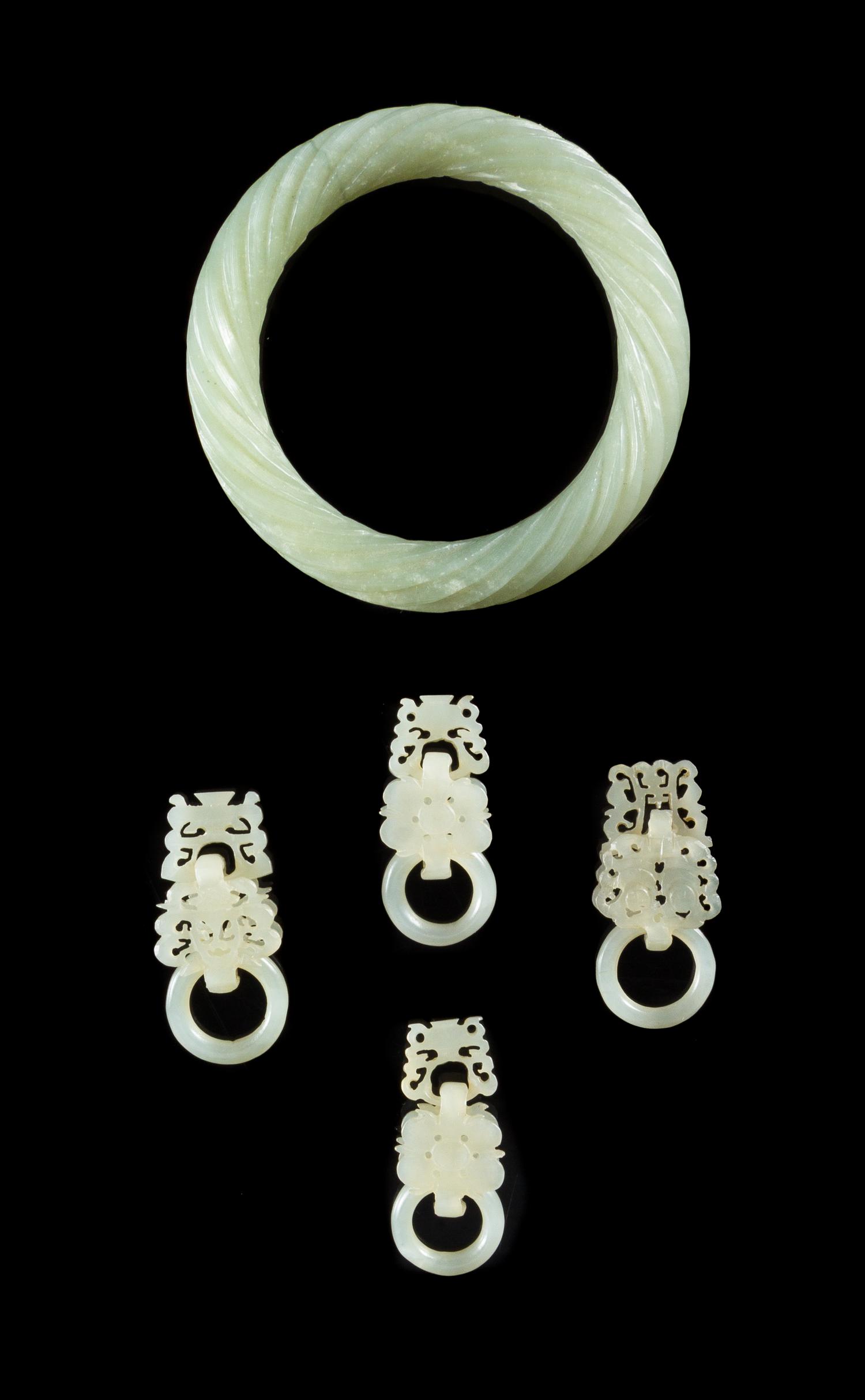 Five Celadon Jade Articles Diameter of largest 3 1/8 inches.