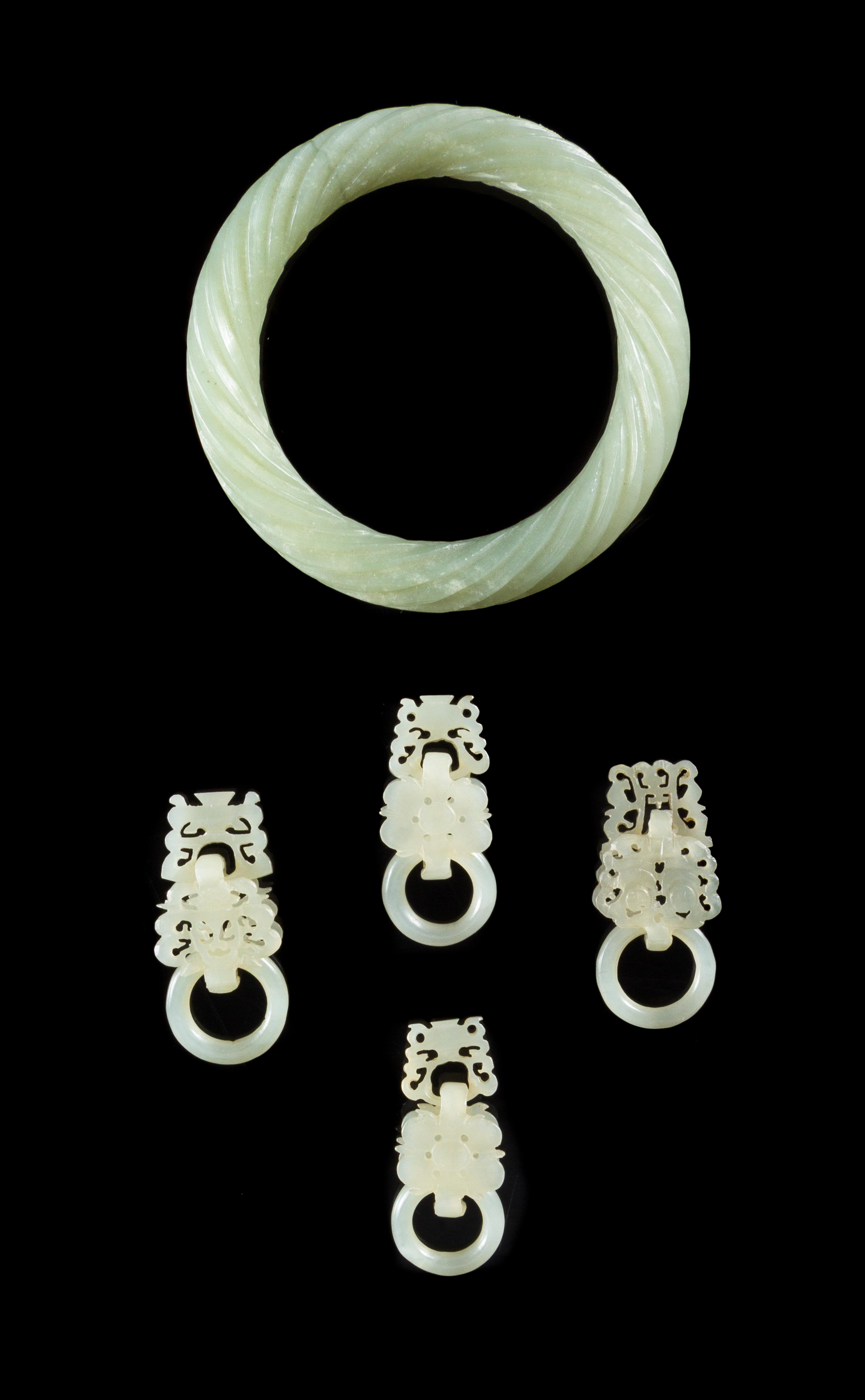 Five Celadon Jade Articles Diameter of largest 3 1/8 inches.
