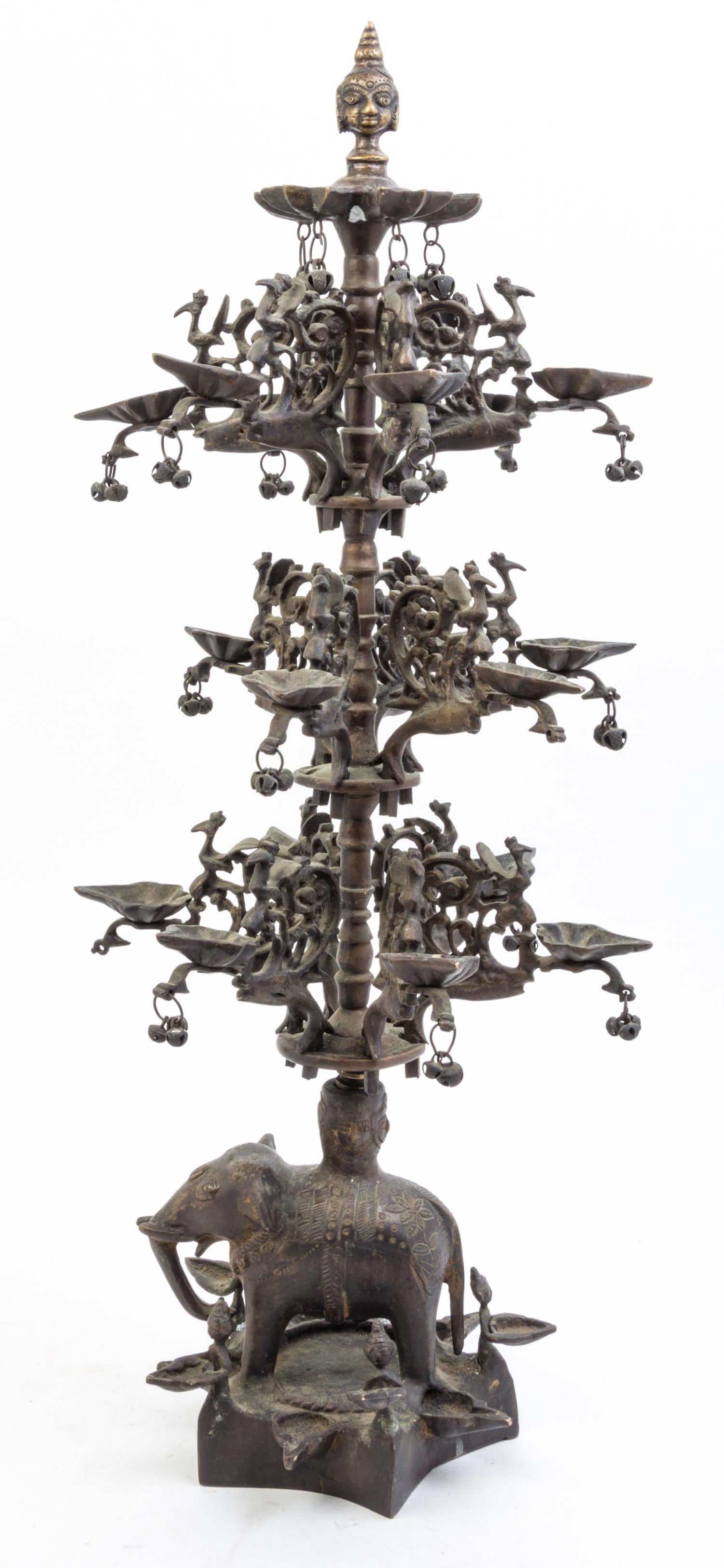 An Indian Bronze Figural Oil Lamp Height 26 inches.