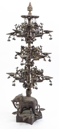 An Indian Bronze Figural Oil Lamp Height 26 inches.