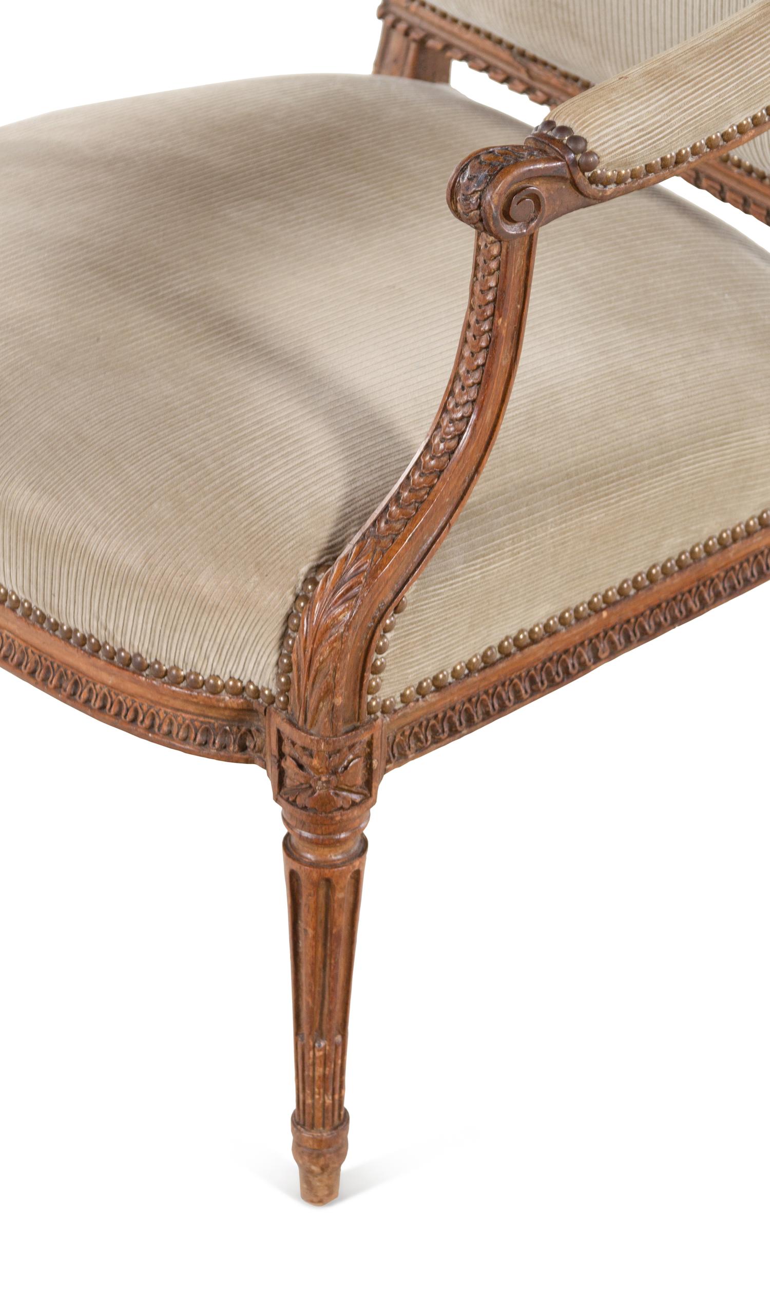 A Pair of Louis XVI Beechwood Fauteuils