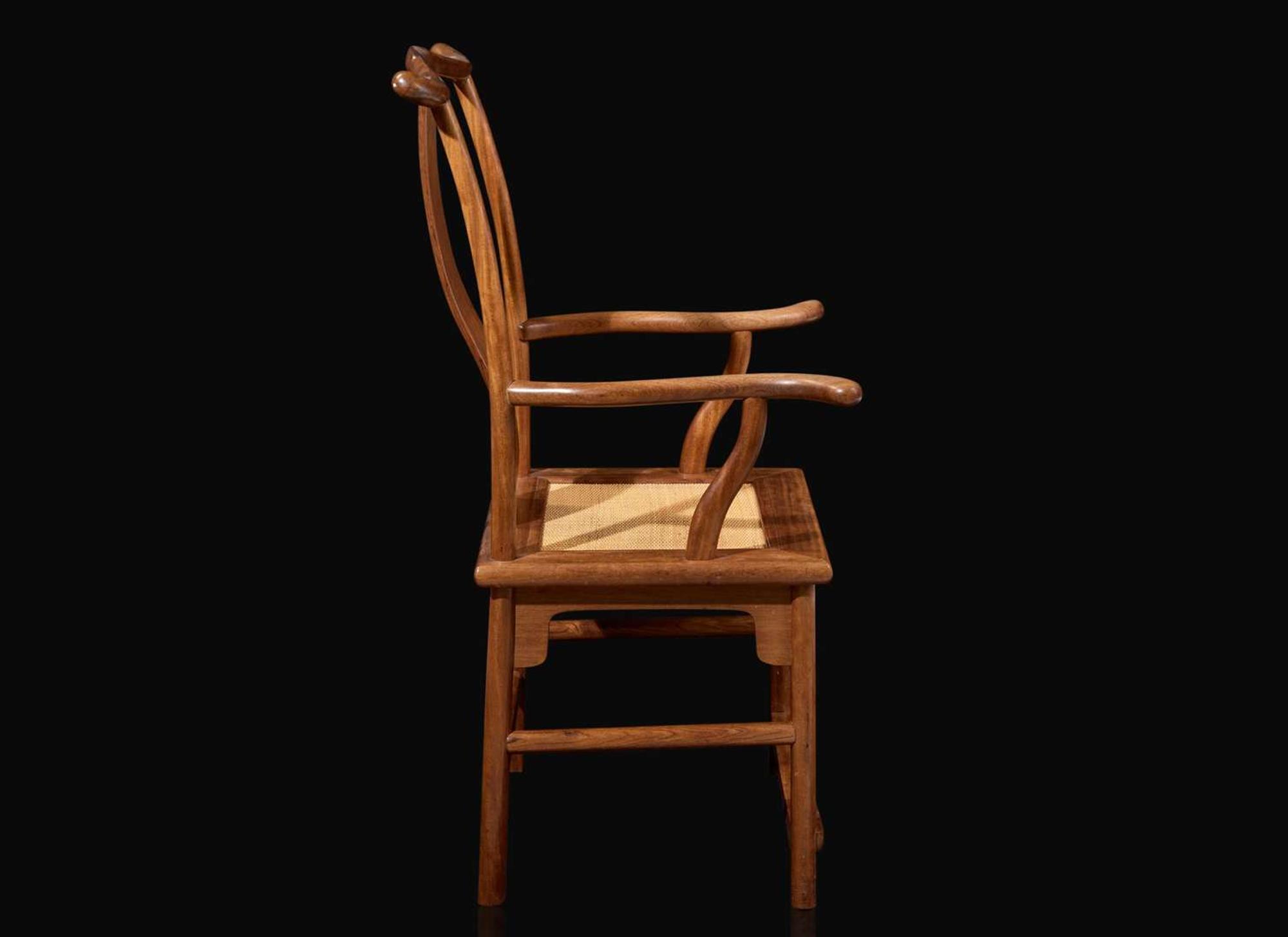 A Chinese hardwood "Official's Hat" Armchair, Guanmaoyi, 20th century 黃花梨扶手官帽椅 二十世紀