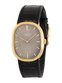 PATEK PHILIPPE, 18K YELLOW GOLD 'ELLIPSE' WATCH WITH TROPICAL BLUE DIAL