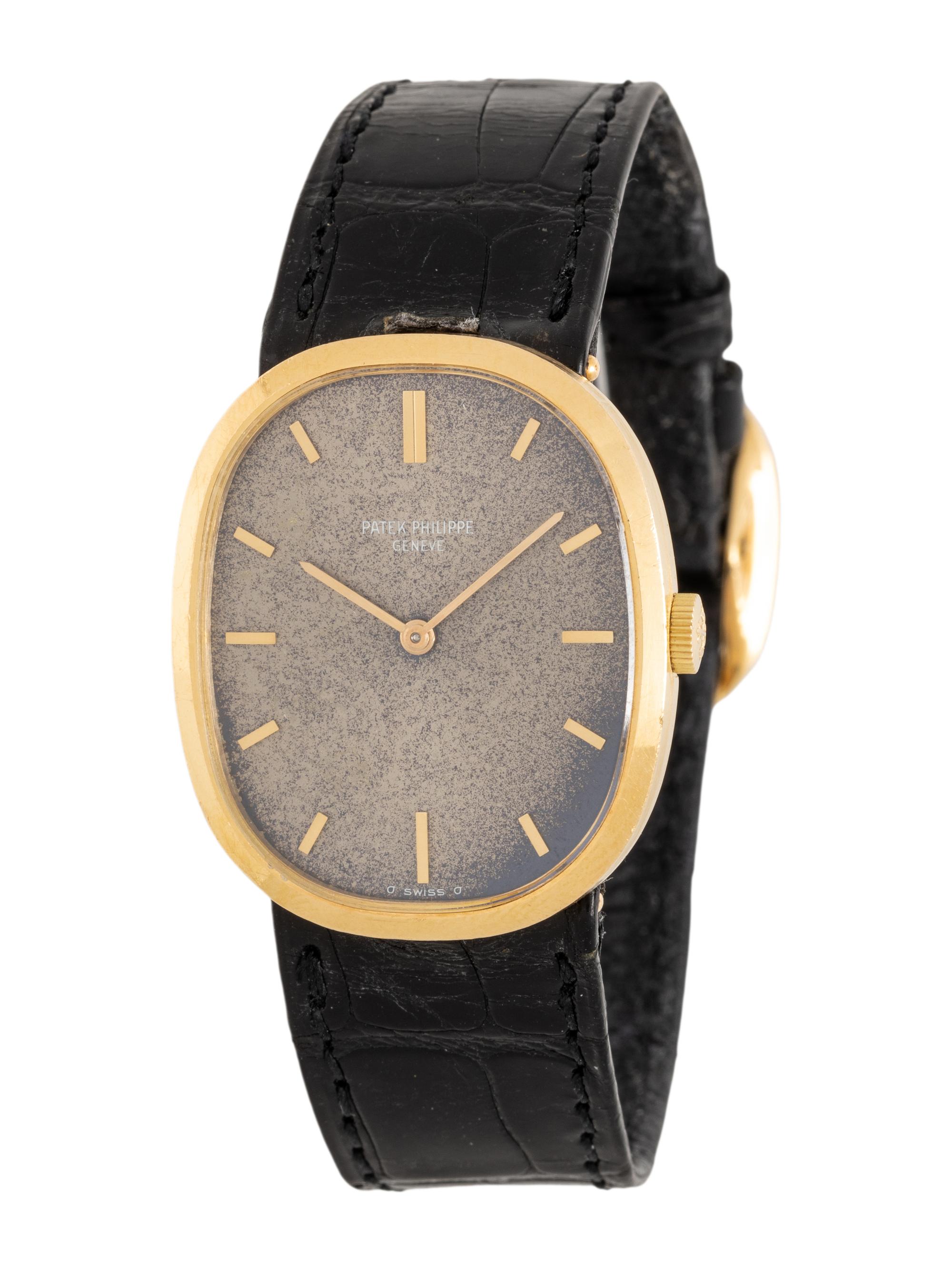 PATEK PHILIPPE, 18K YELLOW GOLD 'ELLIPSE' WATCH WITH TROPICAL BLUE DIAL