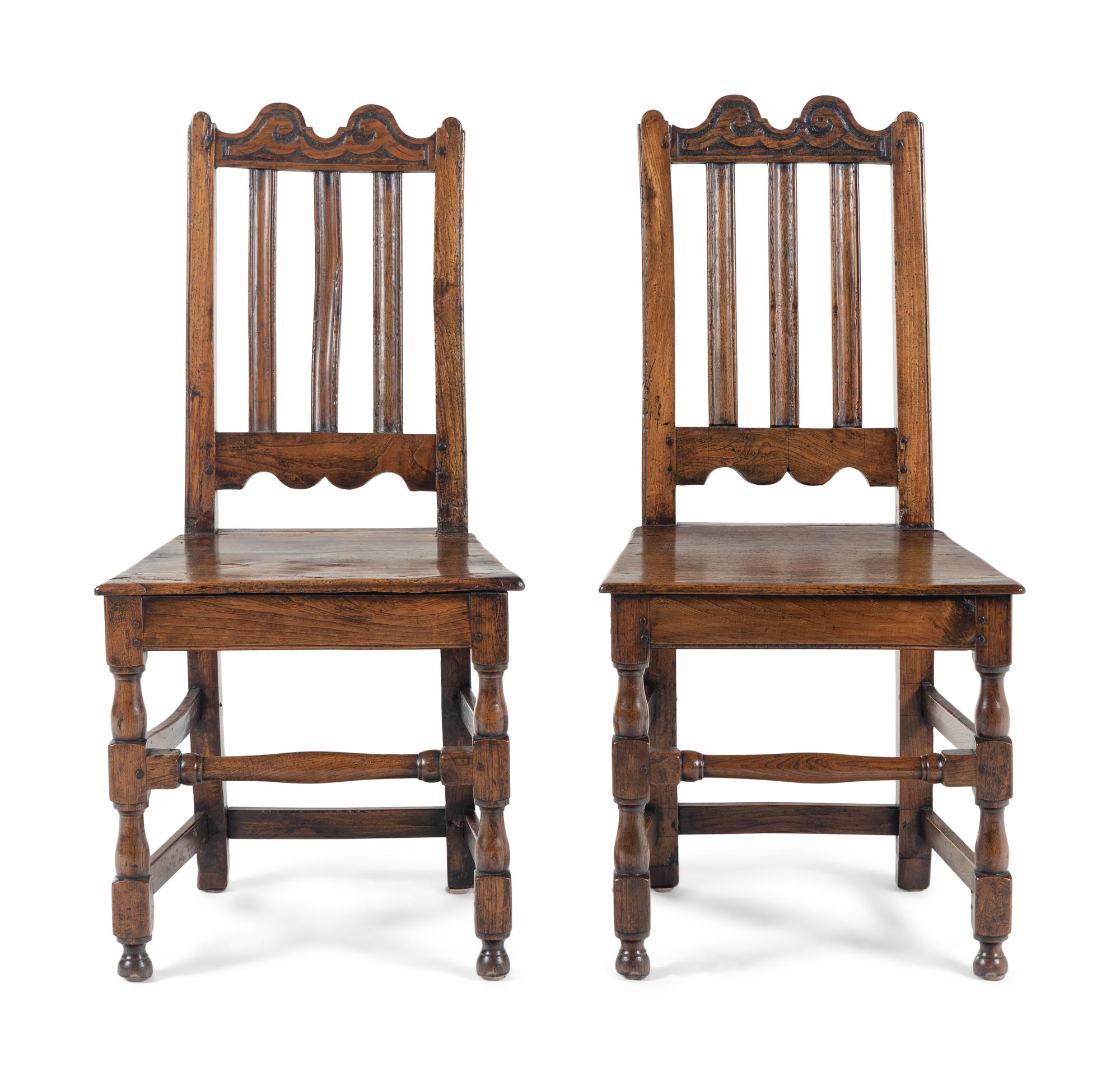 A Pair of Charles II Elm Back Stools