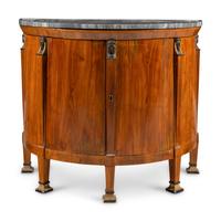 A German or Austrian Fruitwood, Part Ebonized and Parcel Gilt Marble Top Cabinet