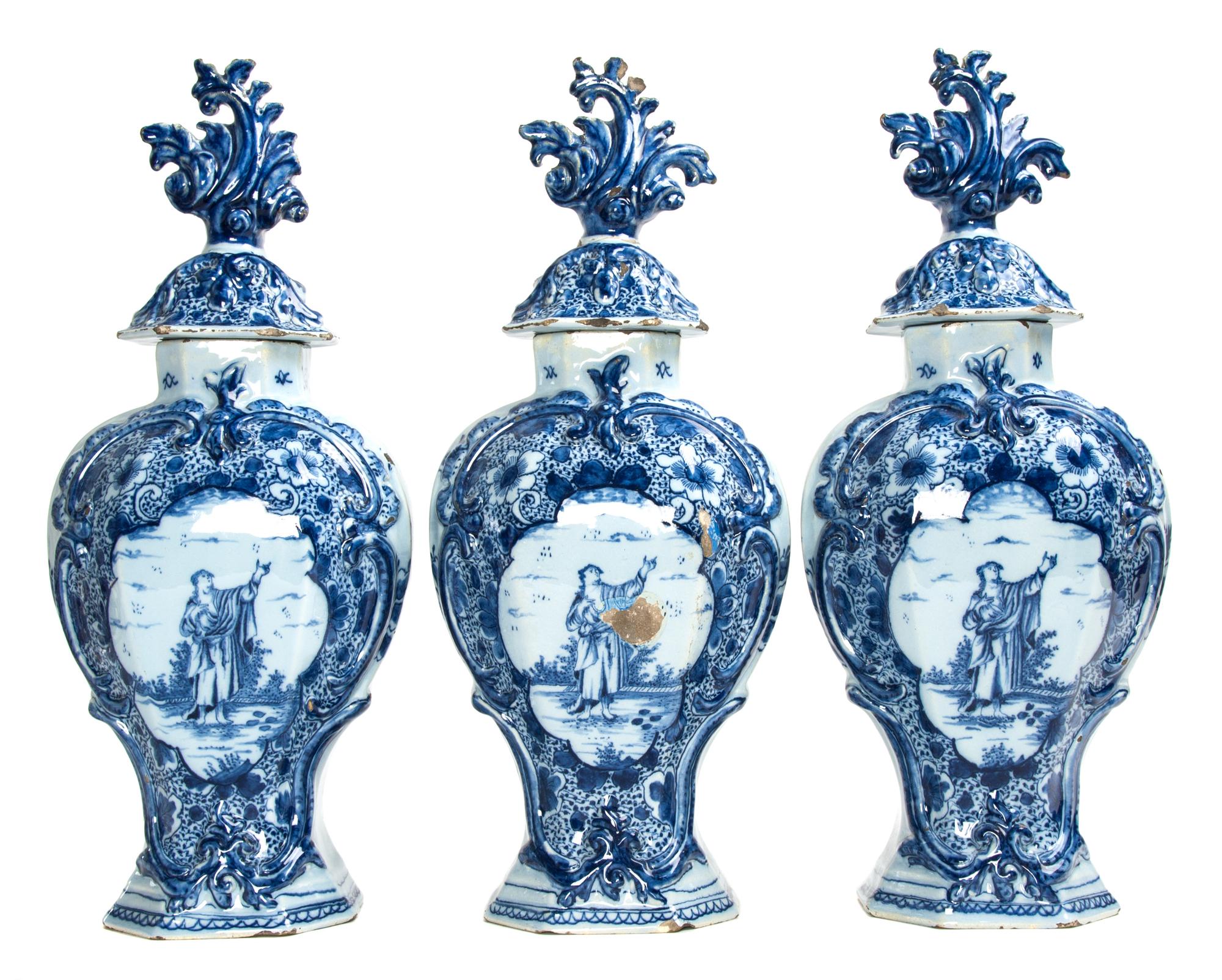Three Delft Tin Glaze Porcelain Covered Vases Height 17 1/4 inches. — EARLY 20TH CENTURY