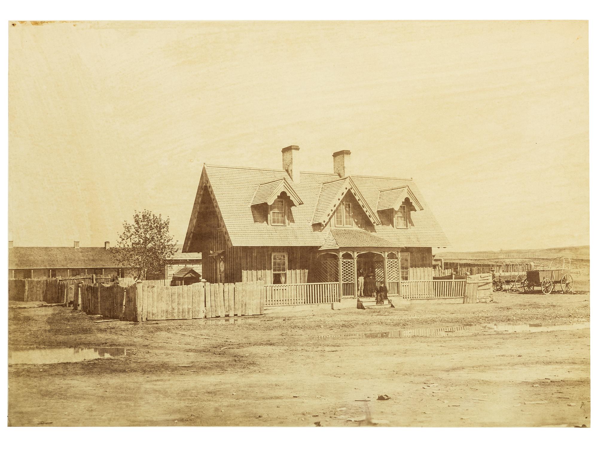 [LATE INDIAN WARS]. GARDNER, Alexander (1821-1882). Imperial albumen photograph. Scenes in the Indian Country [Col. Bullock residence at Fort Laramie].