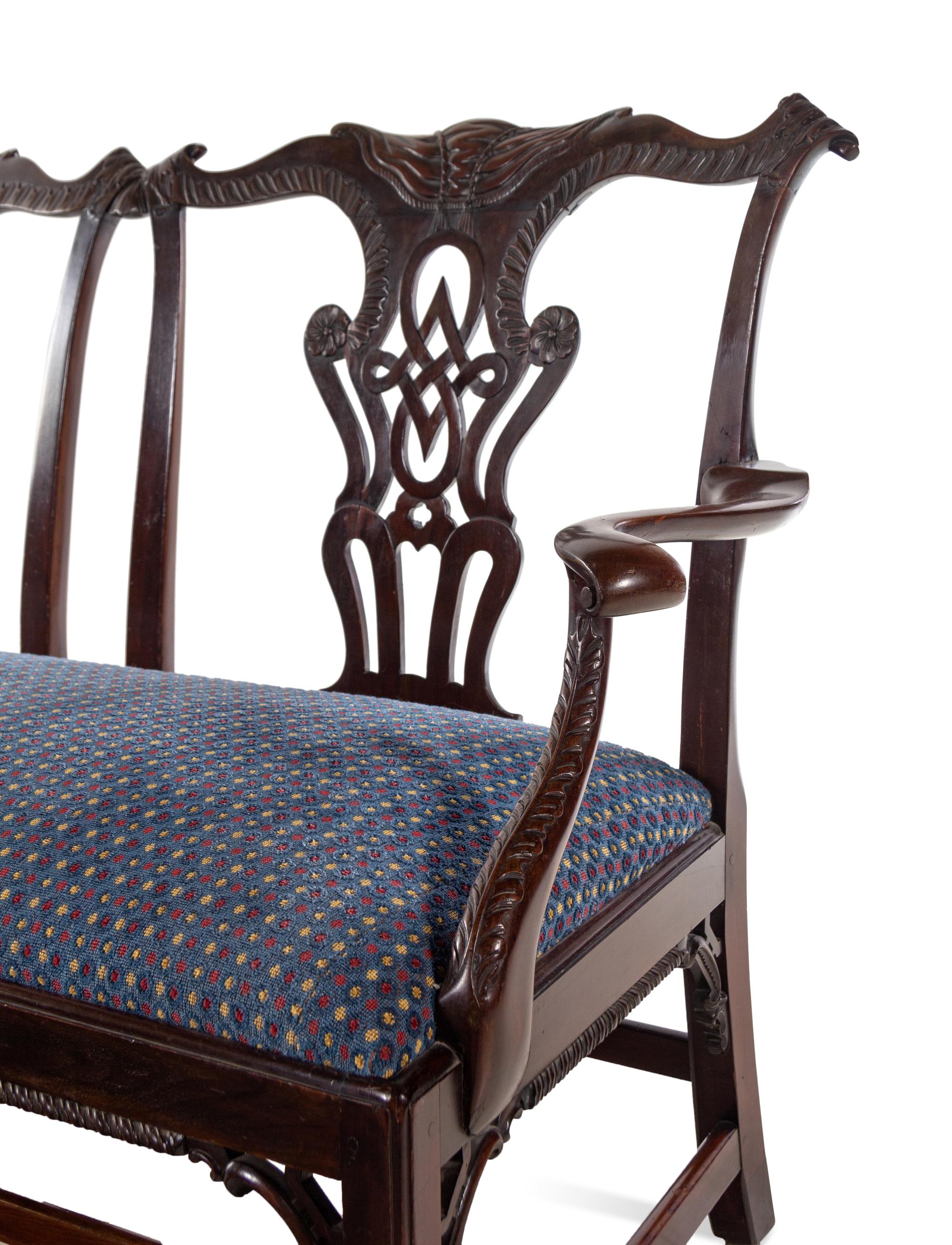 A George III Style Carved Mahogany Double Chair-Back Settee after a Design by Thomas Chippendale