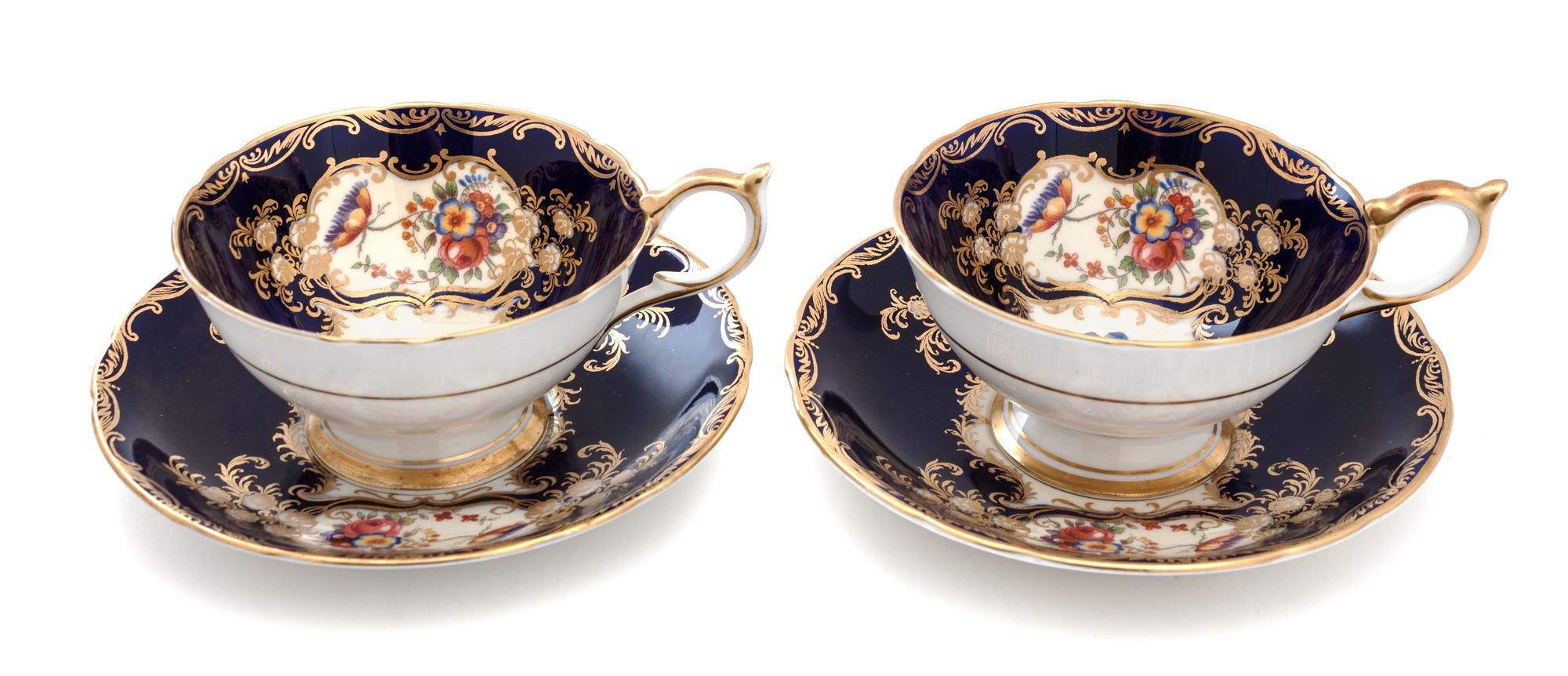 An Aynsley Aristocrat Partial Tea Service Teacup height 2 1/4 x 4 diameter inches.