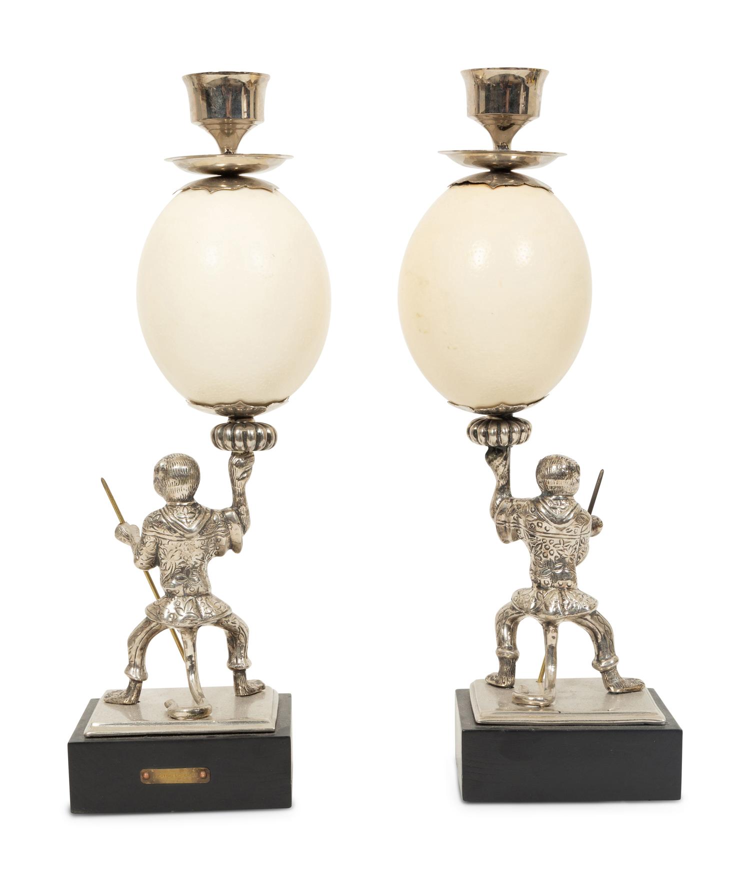 A Pair of Anthony Redmile Ostrich Egg and Nickel-Plated Candlesticks