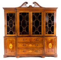 An English Mahogany Breakfront Bookcase HEAL & SON, LONDON, EARLY 20TH CENTURY Height 96 x width 91 x depth 25 inches. — HEAL & SON, LONDON, EARLY 20TH CENTURY