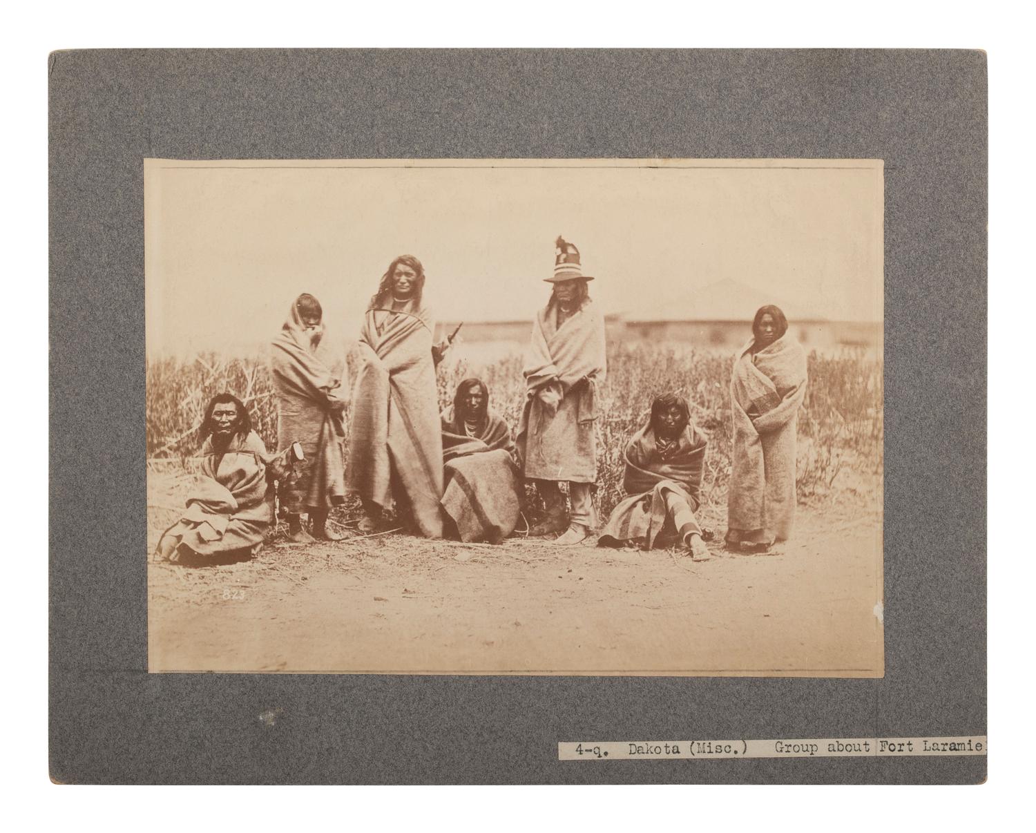 [NATIVE AMERICANS]. [GARDNER, Alexander (1821-1882), photographer]. Photograph of Crow Indians at Fort Laramie, Wyoming. [1868, printed later].