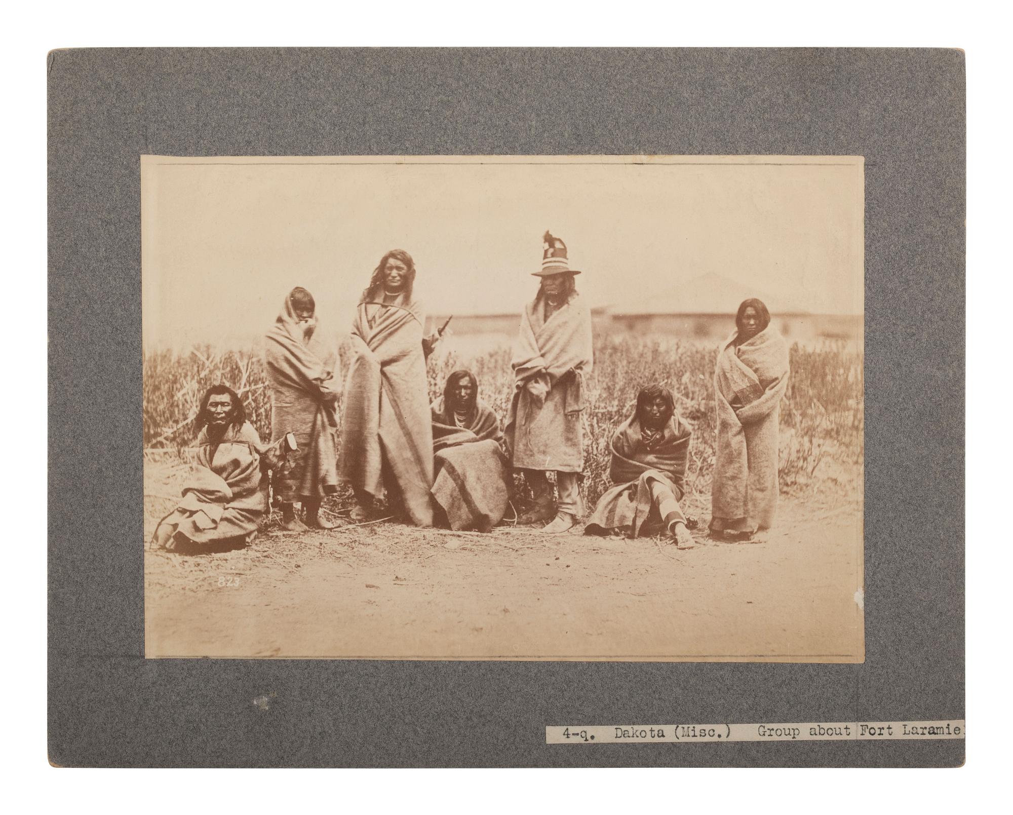 [NATIVE AMERICANS]. [GARDNER, Alexander (1821-1882), photographer]. Photograph of Crow Indians at Fort Laramie, Wyoming. [1868, printed later].