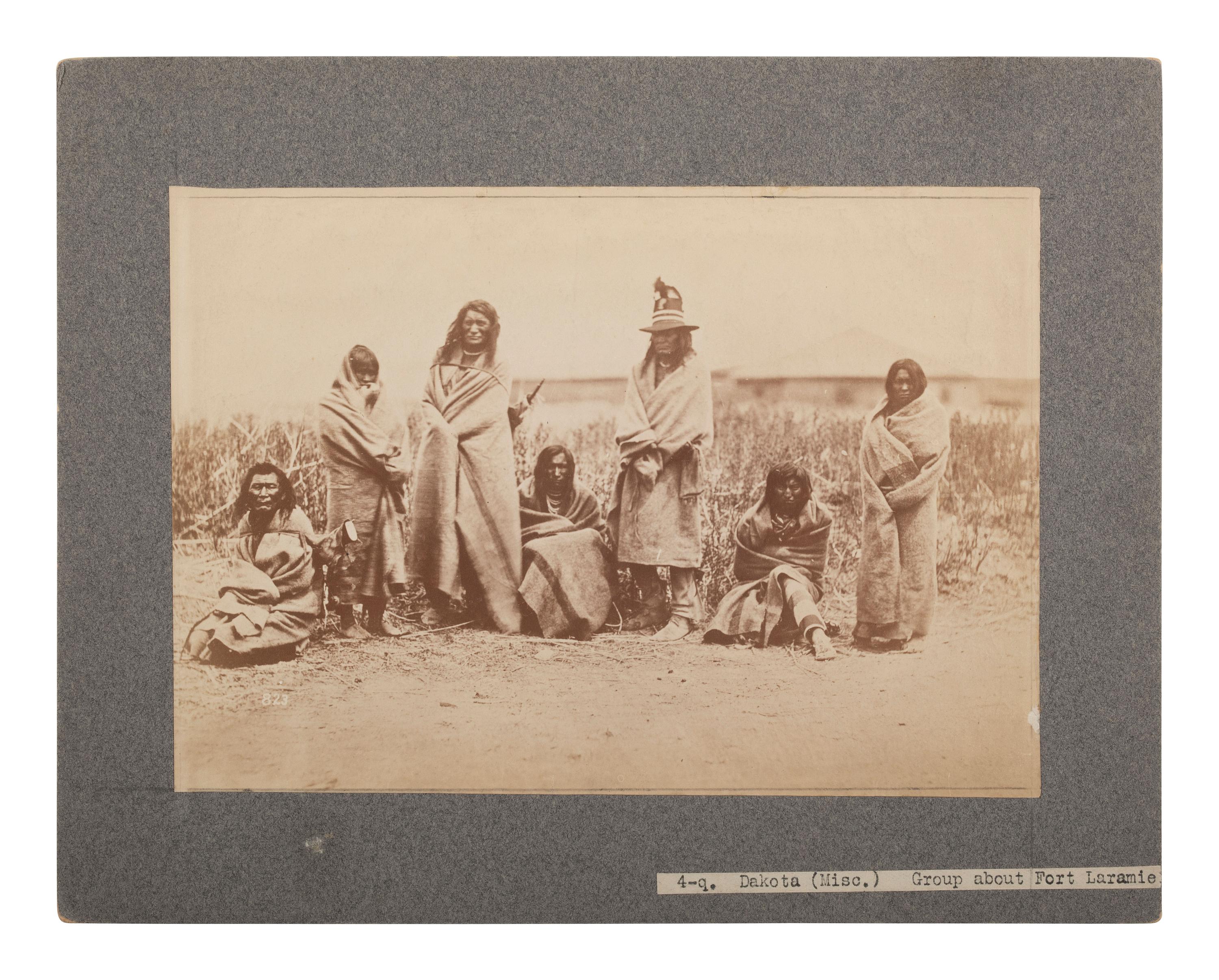 [NATIVE AMERICANS]. [GARDNER, Alexander (1821-1882), photographer]. Photograph of Crow Indians at Fort Laramie, Wyoming. [1868, printed later].