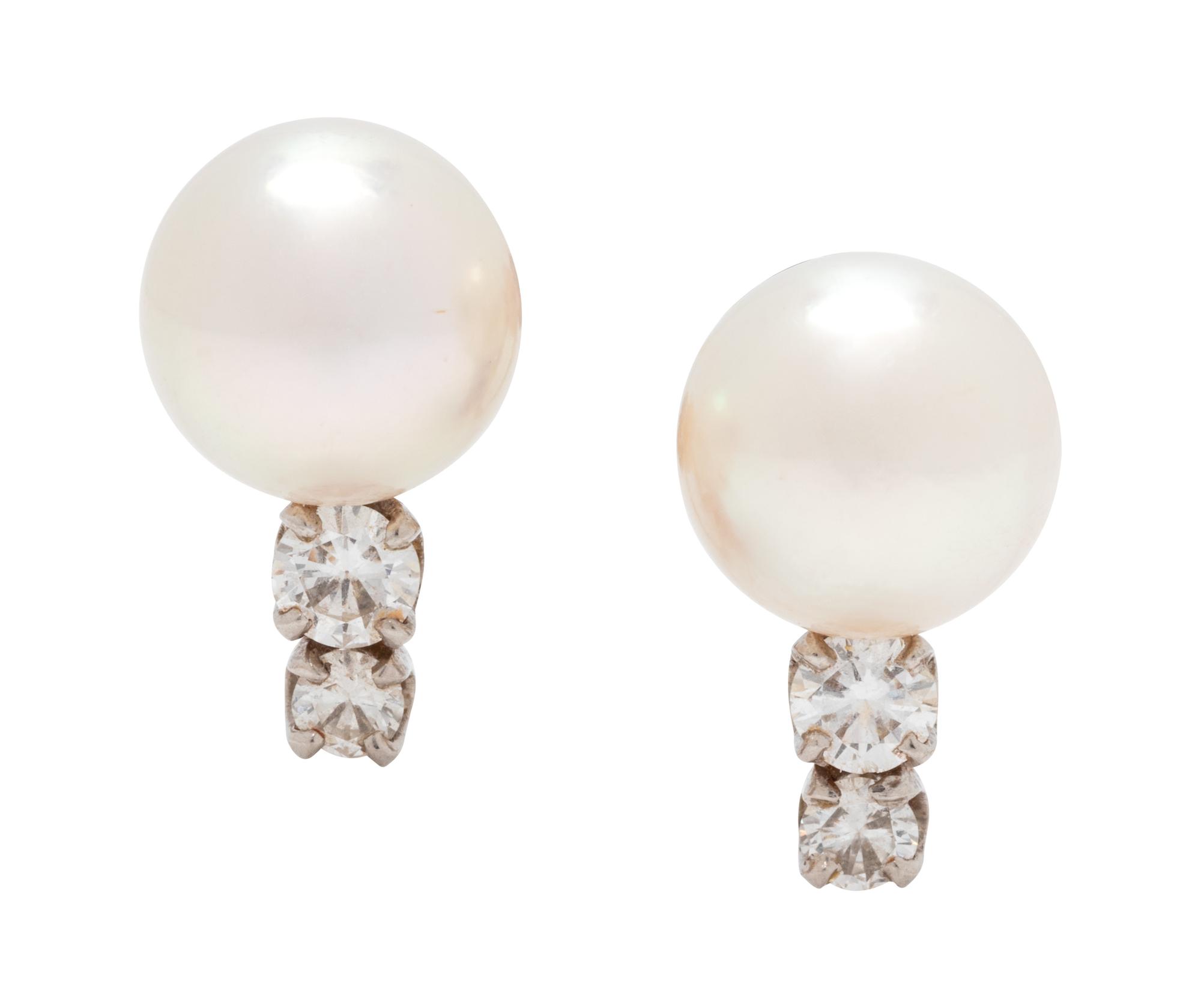 A Pair of 14 Karat White Gold, Cultured Pearl and Diamond Earclips,