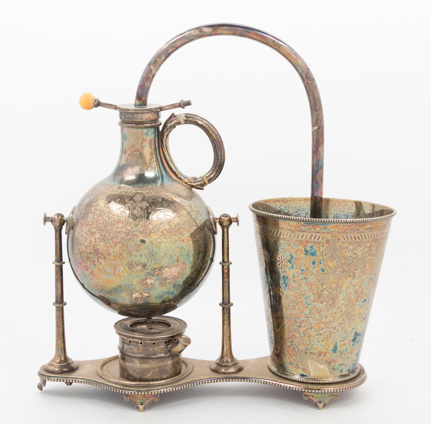 An English Silver-plate Distiller Width 13 inches. — 19TH/20TH CENTURY