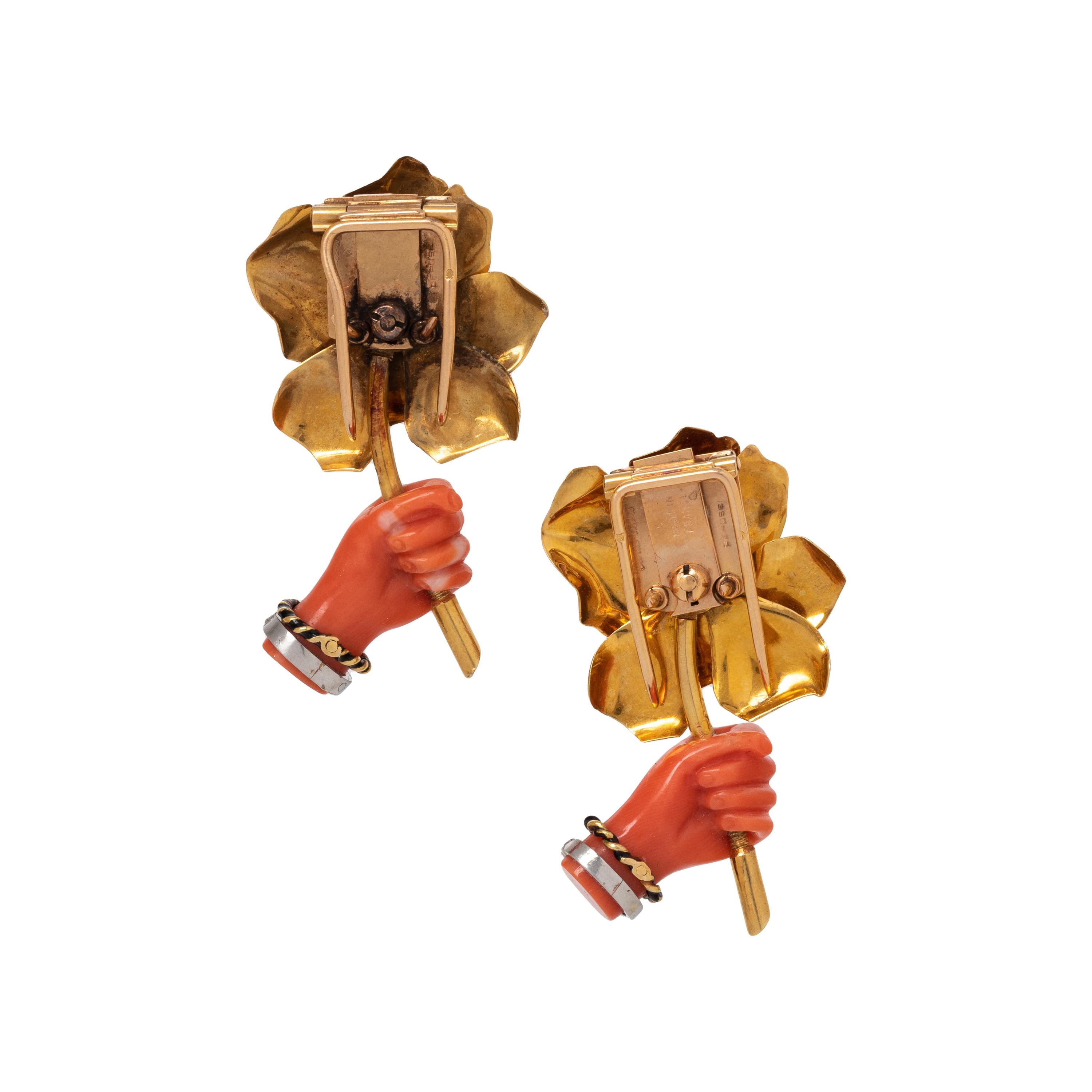 CARTIER, ART DECO, PAIR OF CORAL, YELLOW GOLD AND DIAMOND 'FLOWER IN HAND' BROOCHES