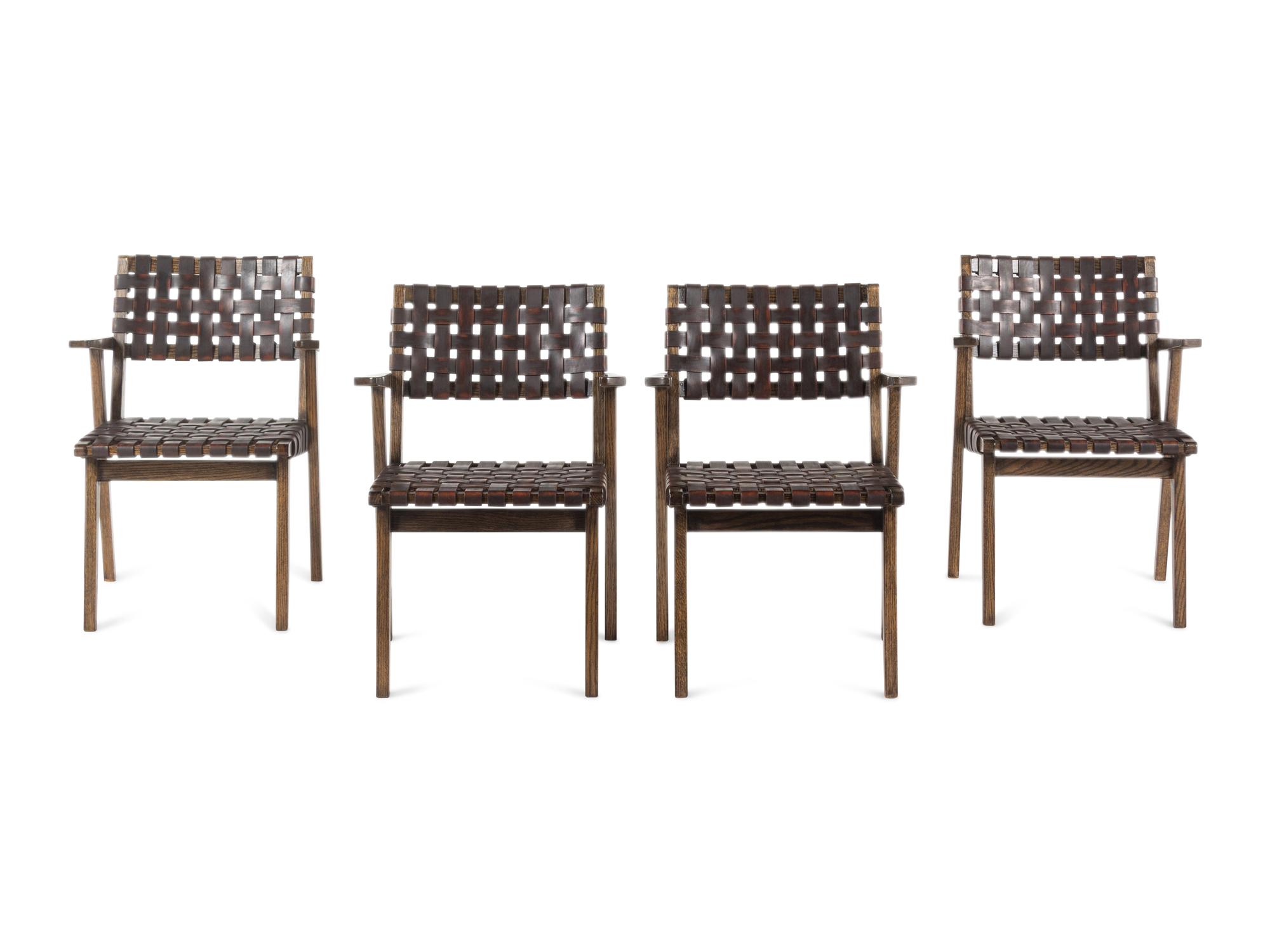 A Set of Four Contemporary Oak and Leather Armchairs