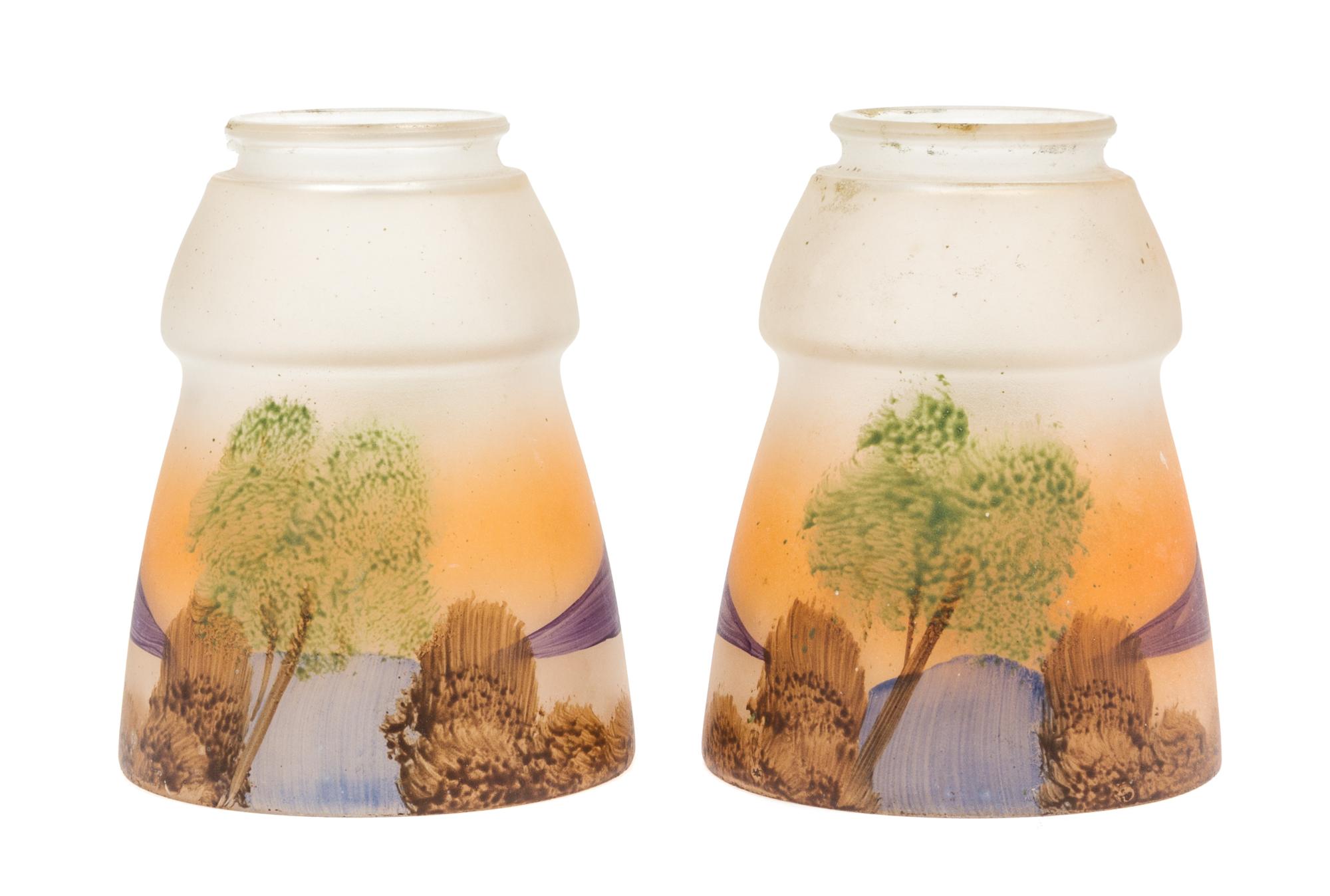 A Pair of Obverse Decorated Glass Shades Height 5 inches.
