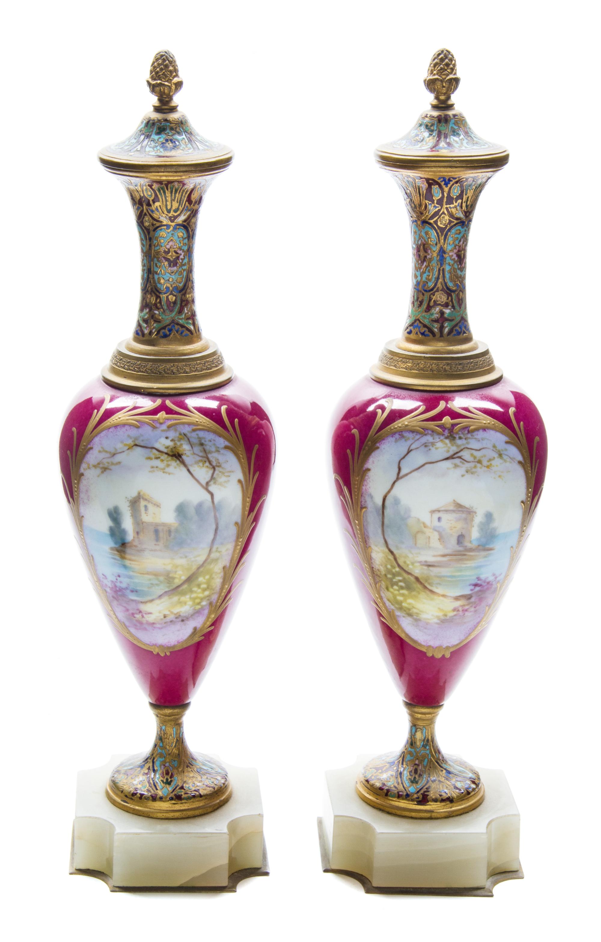 A Pair of Champleve and Gilt Metal Mounted Sevres Style Porcelain Vases Height 12 inches. — 19TH/20TH CENTURY