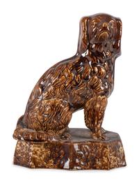 A Rockingham Glazed Yellowware Spaniel, Probably East Liverpool, Ohio