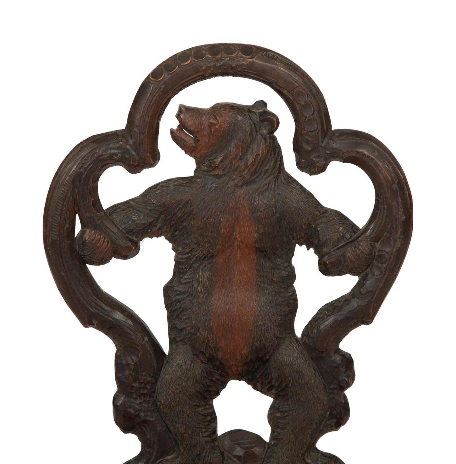 A Black Forest Carved Wood Child's Chair