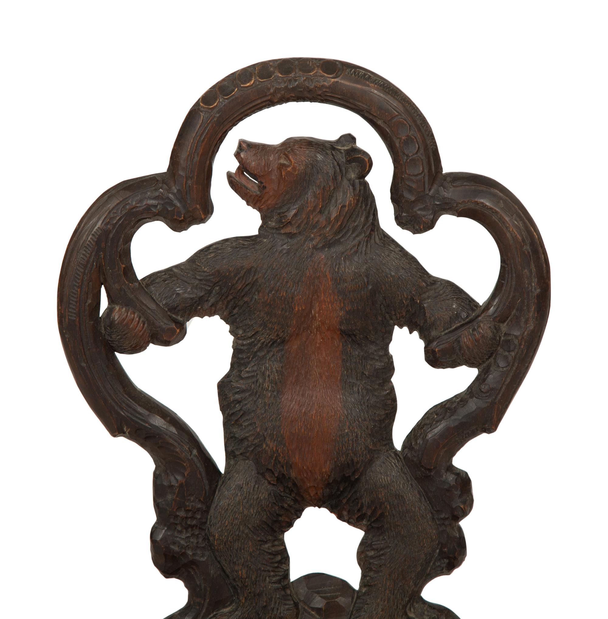 A Black Forest Carved Wood Child's Chair