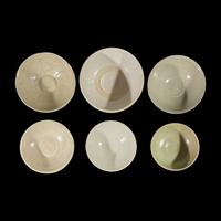 Eight Southeast Asian Celadon and Whiteware Bowls, 14th-16th Century — 十四-十六世紀 東南亞青釉及白釉碗一組八件