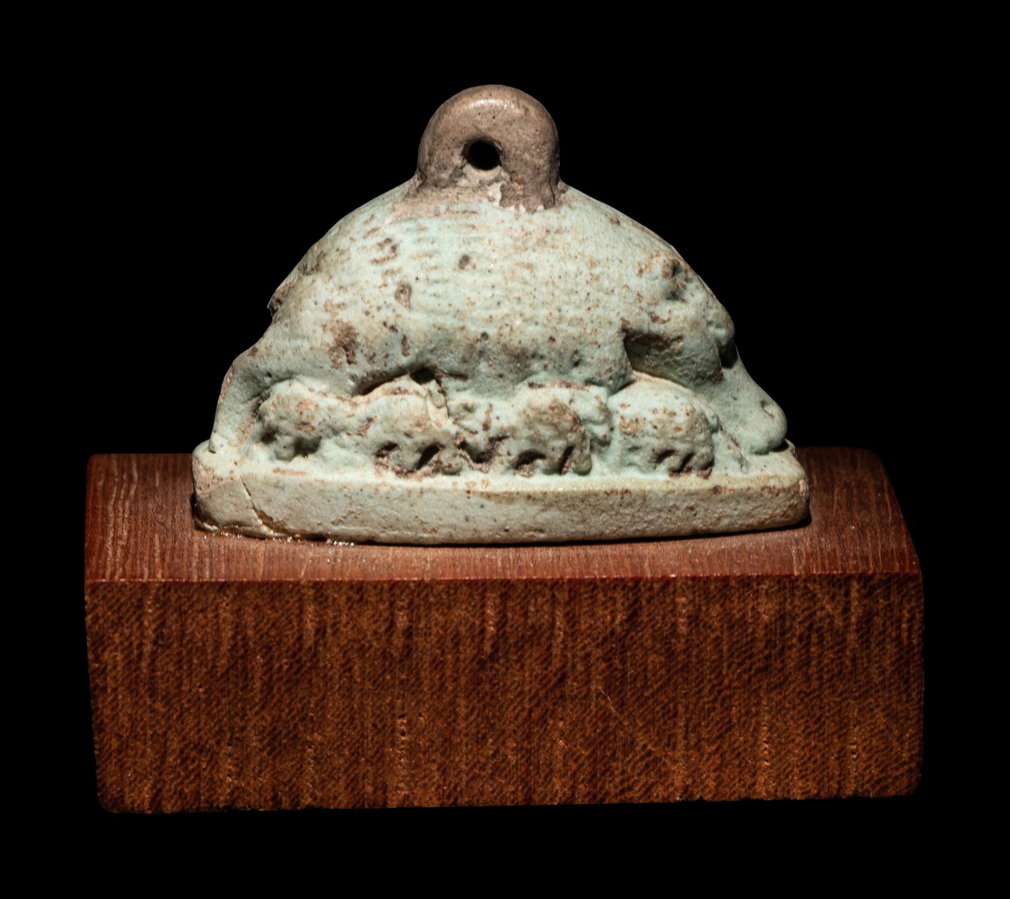 An Egyptian Faience Sow with Piglets