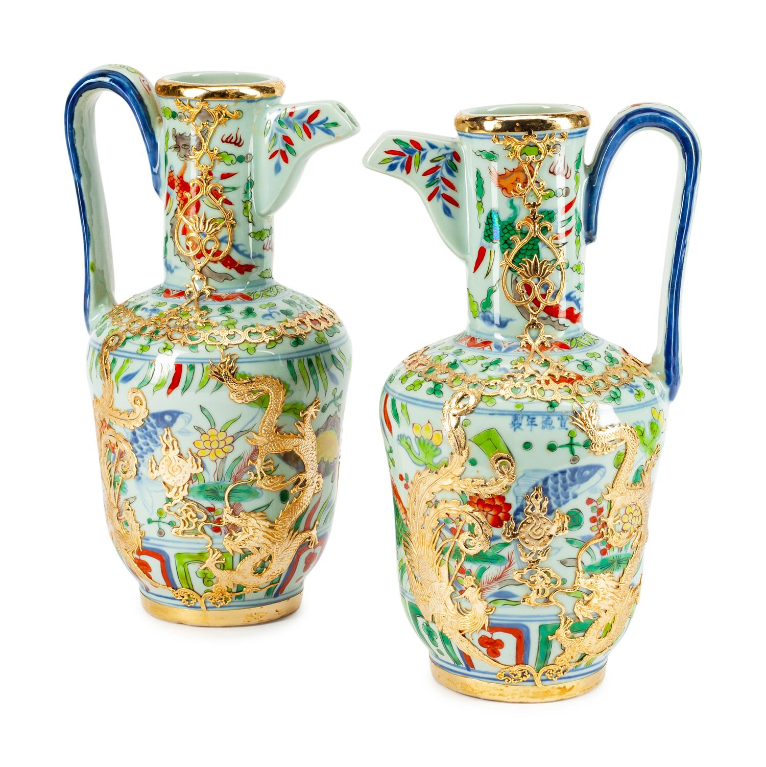 A Pair of Chinese Bronze-Mounted Porcelain Ewers