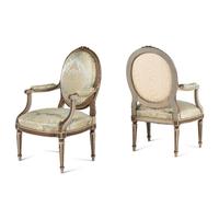A Set Three of Louis XVI Style Grey-Painted and Parcel Gilt Fauteuils