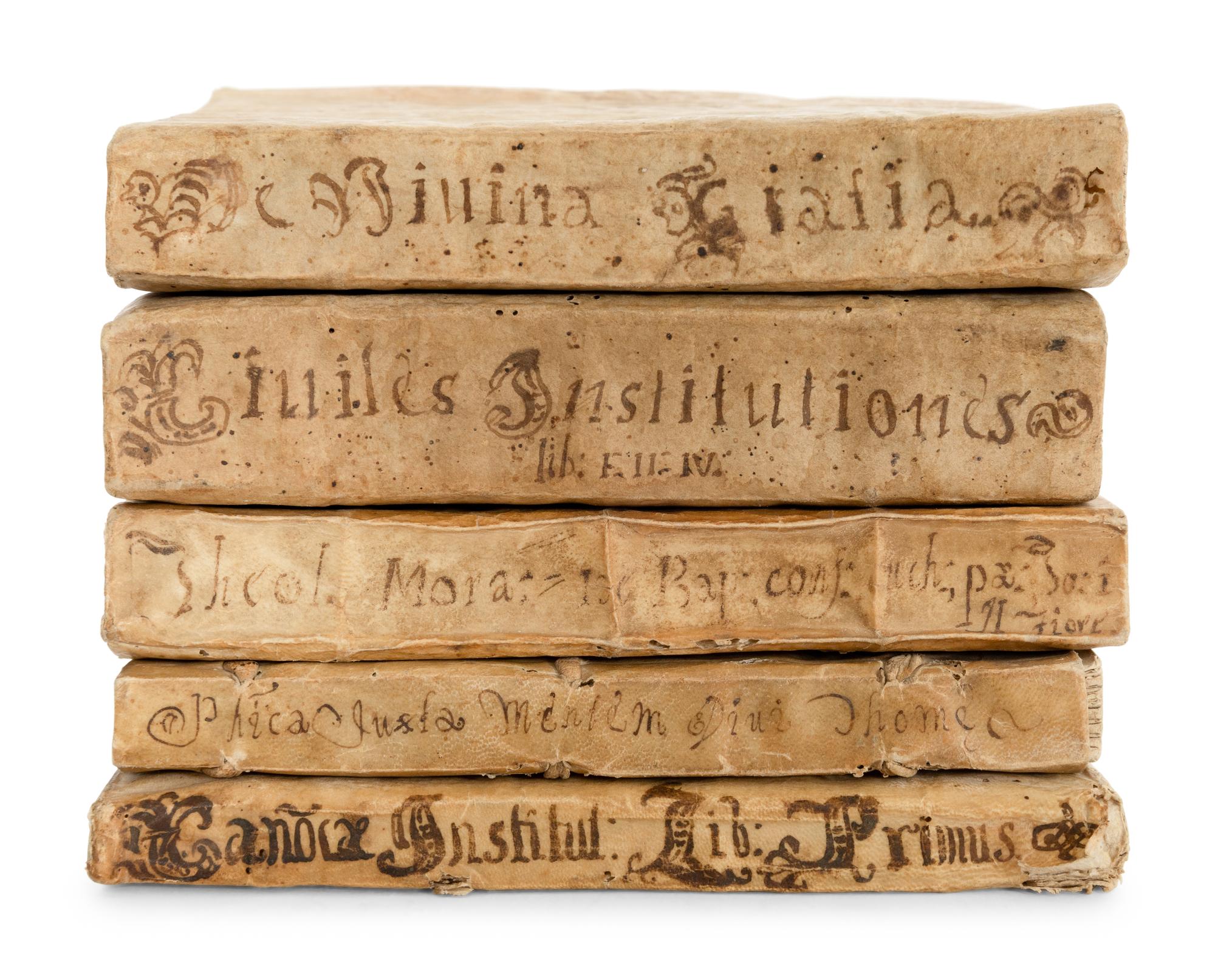A Collection of Five Parchment Bound Manuscripts