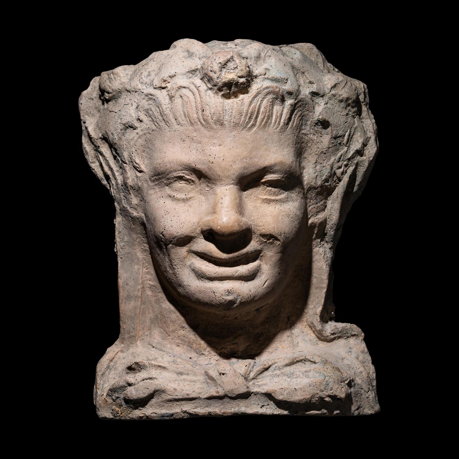 An Etruscan Terracotta Head of a Satyr