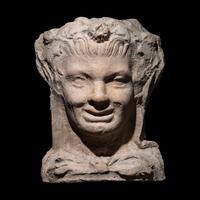 An Etruscan Terracotta Head of a Satyr